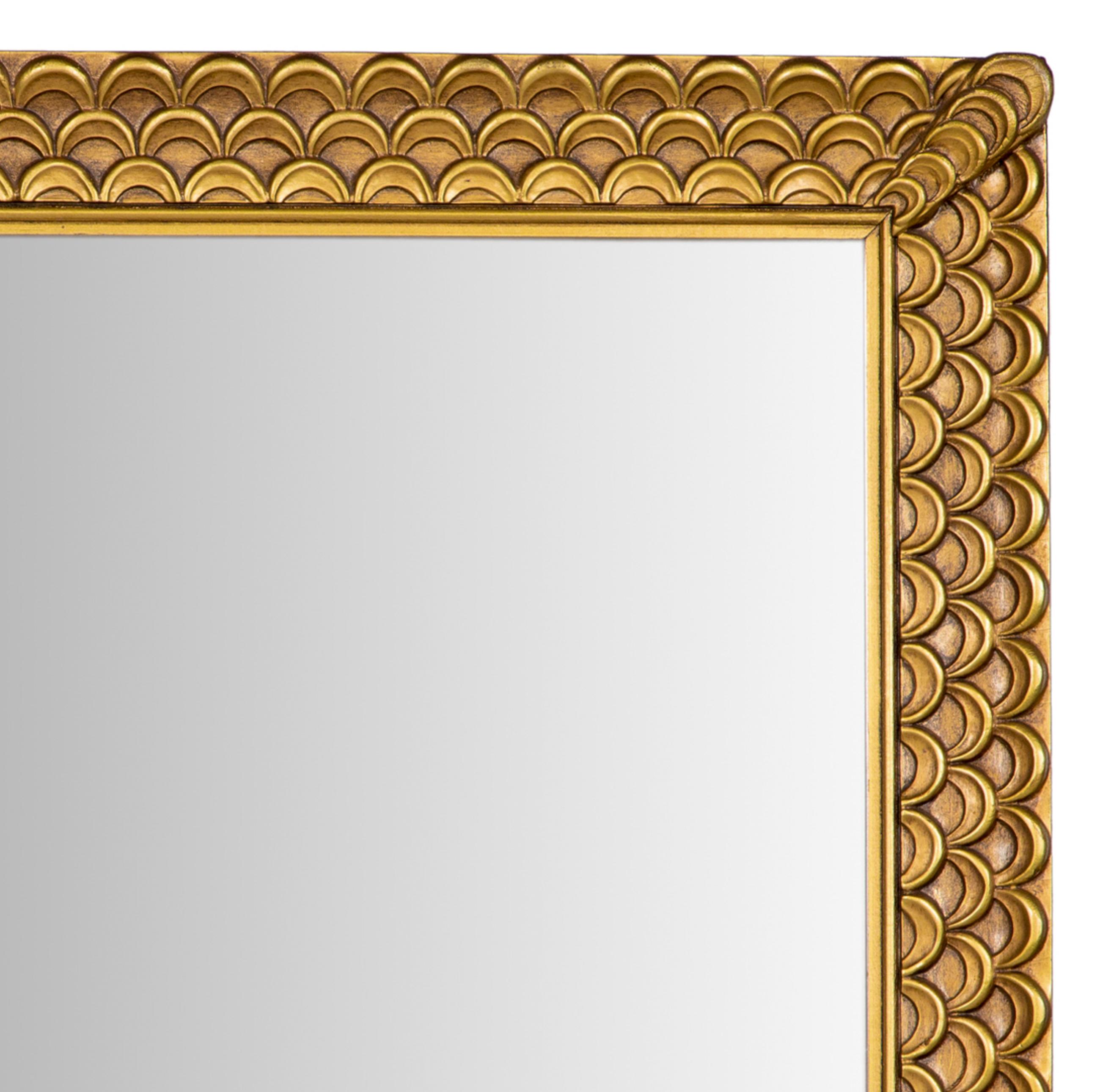 A unique overmantle gilded mirror with three rows of scallops on frame and ascending scallops covering corner joints, circa 1940s. Sold by Schuster's Milwaukee with original label retained on newly papered back. Schuster's department store chain,