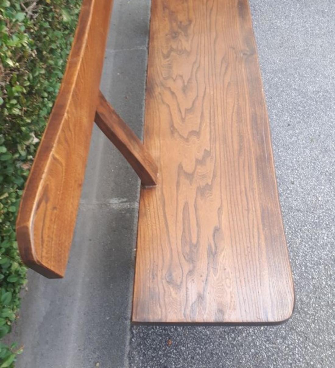 Stunning large Scandinavian bench with a backrest. Entirely handcrafted, like a sculpture, this elegantly rustic bench comfortably seats 3 or even 4 people. Clean design, beautifully crafted.

Designer: Esprit Olavi Hanninen
Manufacturer: Esprit