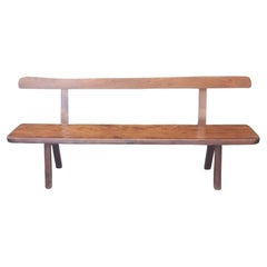Large Scandinavian Brutalist style bench, with backrest, in elm Olavi Hanninen.