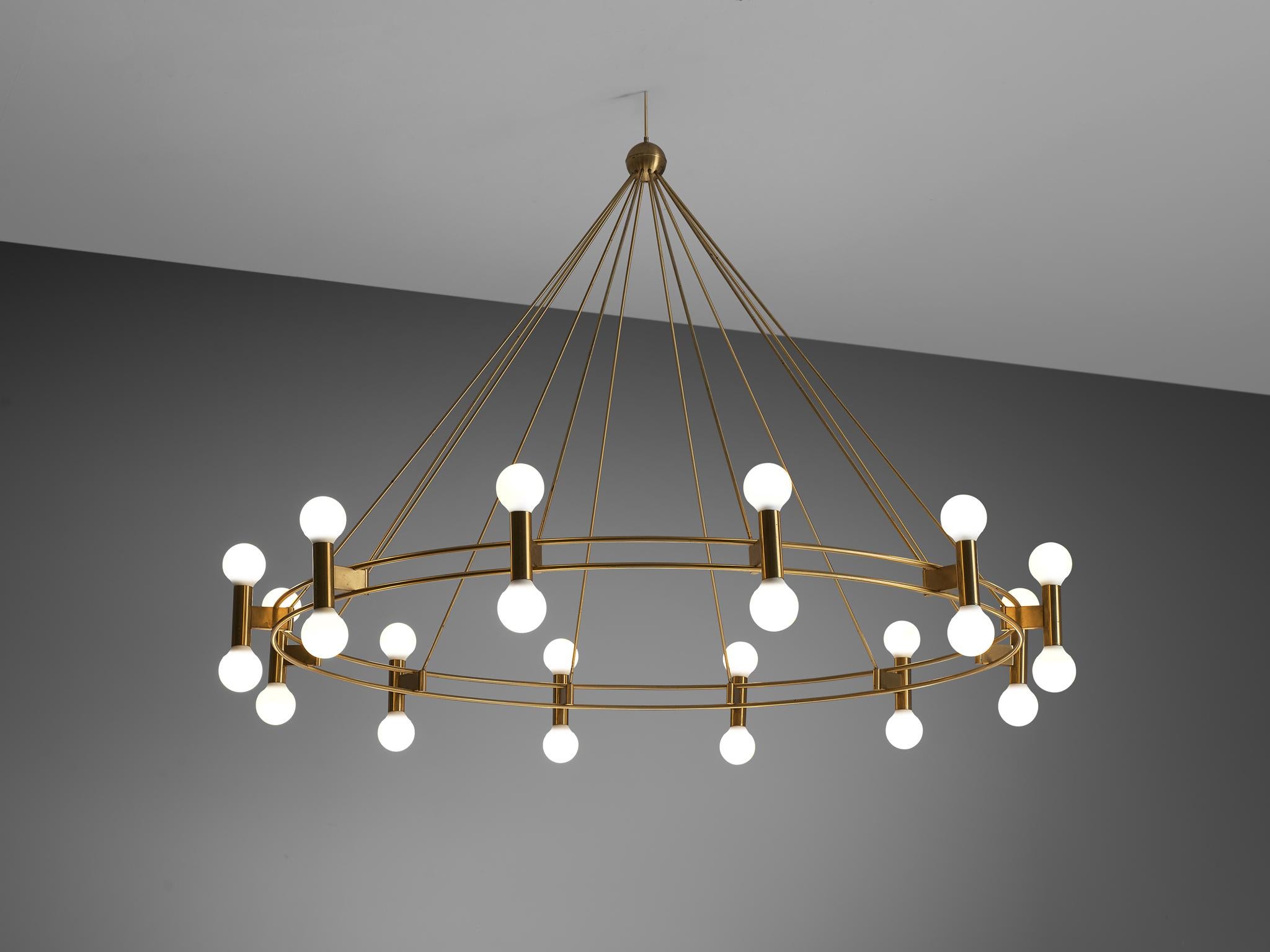 Chandelier with twelve ligh, brass, Scandinavia, 1960s.

This large chandelier is made in the 1960s in Scandinavia and shows typical Scandinavian Modern traits in its modest en minimalistic design. The chandelier consists of two large, thin circular