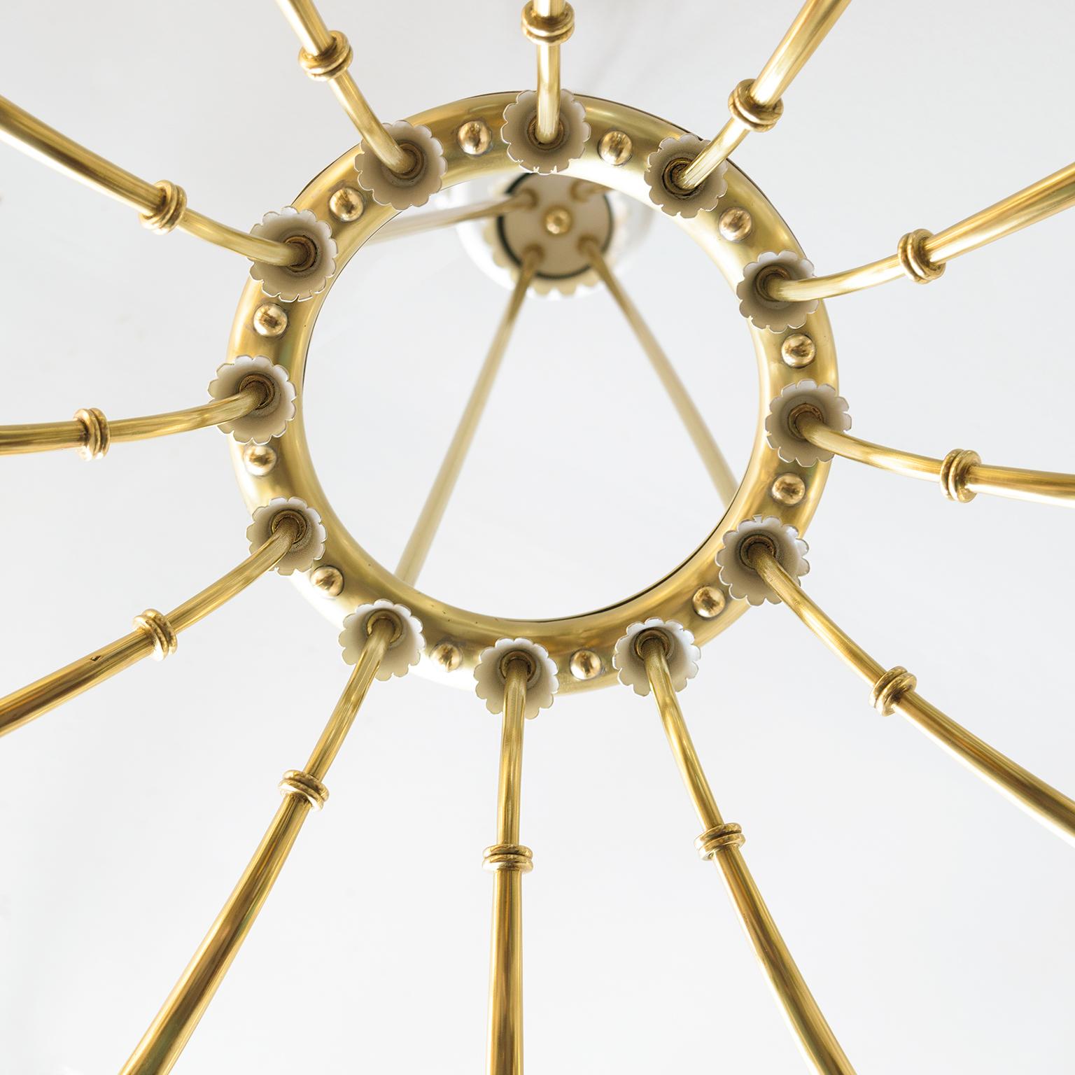 Large Scandinavian Modern 12-Arm Polished Brass Chandelier In Good Condition For Sale In New York, NY