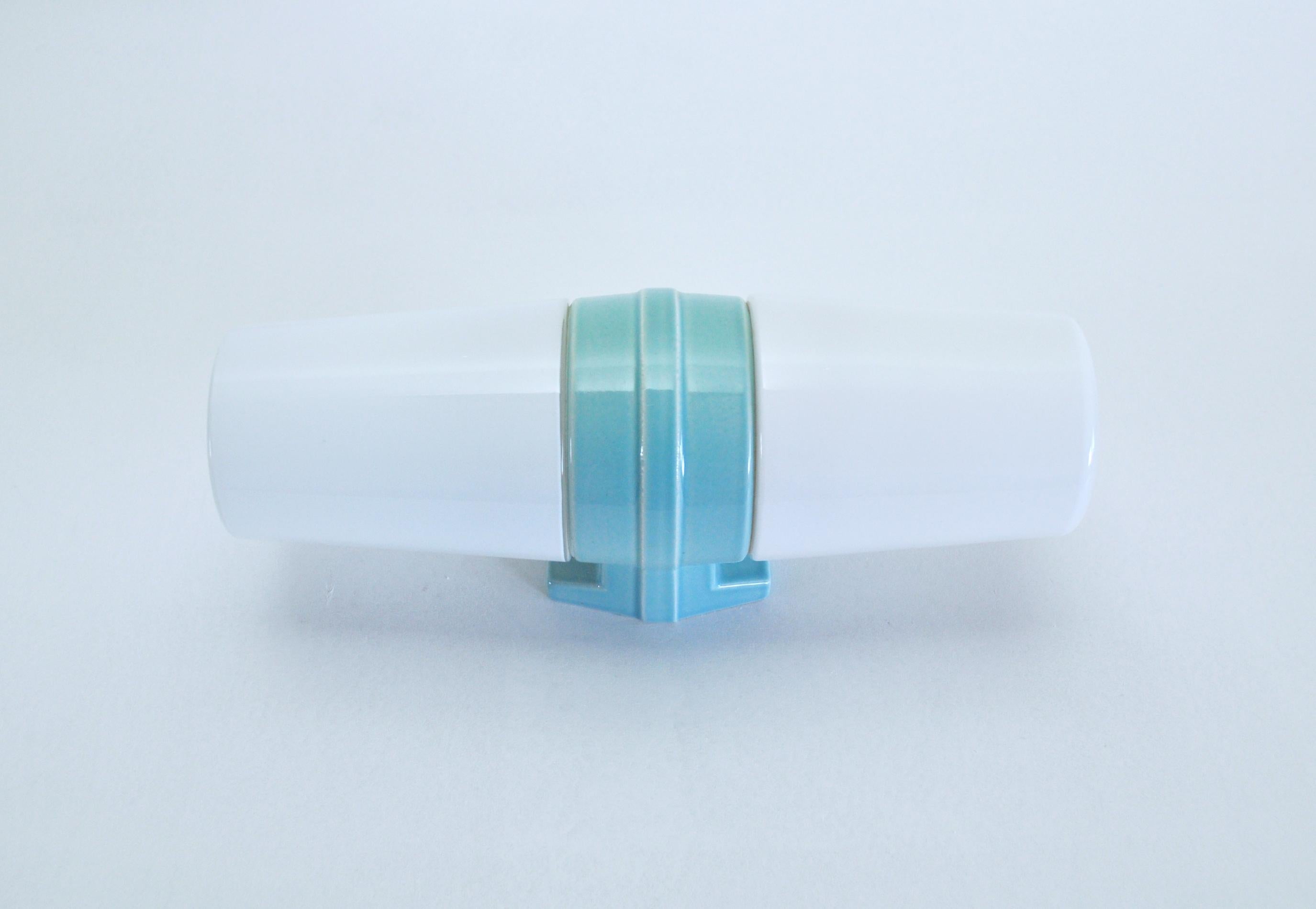 A large Scandinavian Modern turquoise glazed porcelain combined with two milky white opaline glass design by Sigvard Bernadotte for IFÖ, Sweden 1960s. 
Light source: E27 Edison screw fitting max 60W. Made for wet areas such as bathrooms, but