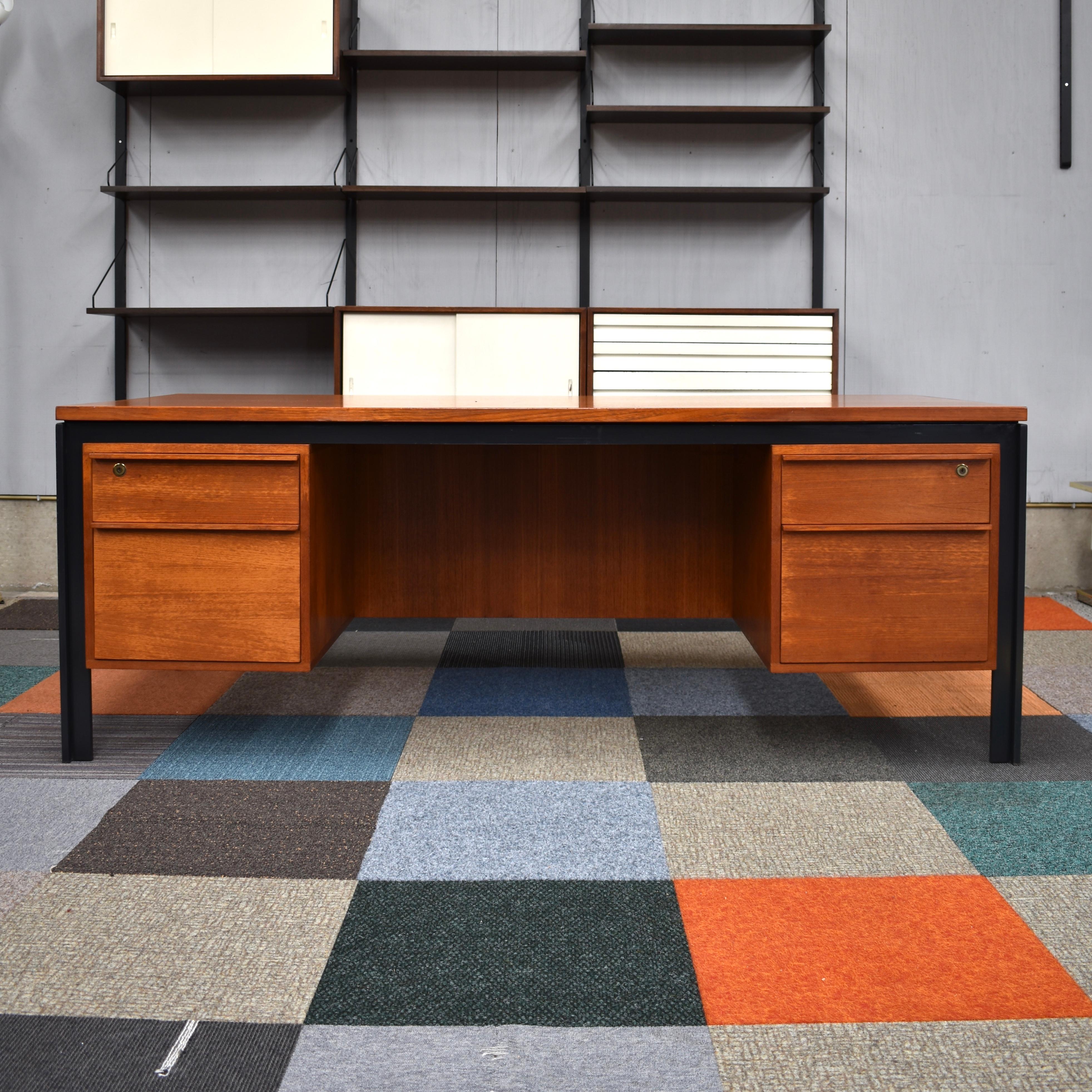 Large Scandinavian desk in teak and metal, circa 1970. The desk is suitable for placing chairs on the back side.

Designer: Unknown

Manufacturer: Unknown

Country: Scandinavia

Date of design: circa 1970

Date of manufacture: