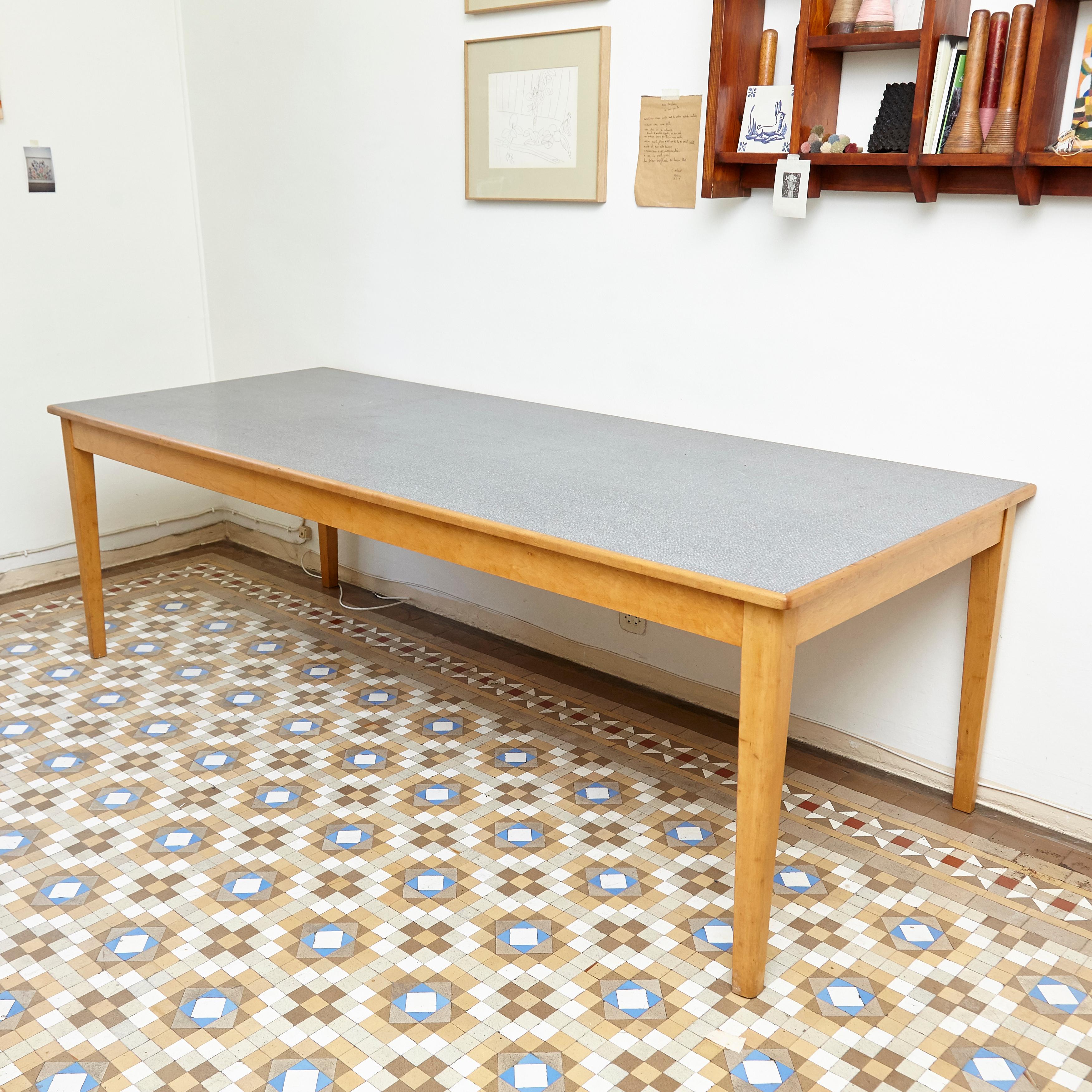 Large Scandinavian wood and Formica dining table, circa 1960
By Unknown designer.

In good original condition with minor wear consistent of age and use, preserving a beautiful patina.