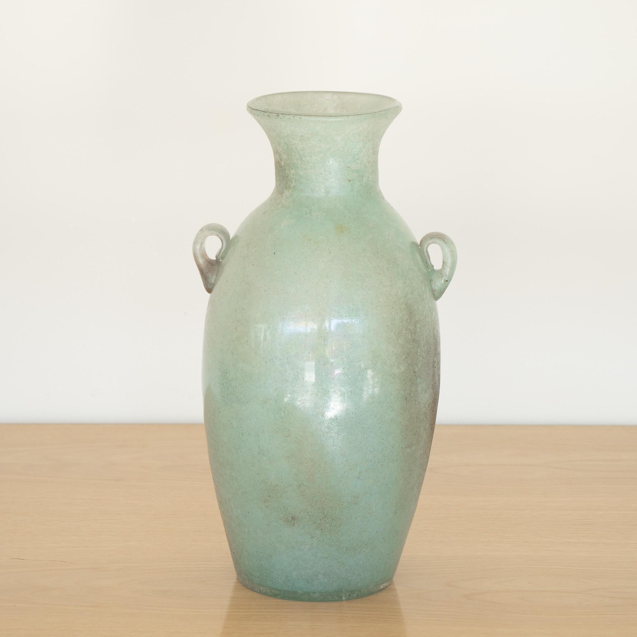 Beautiful vintage Italian Scavo vase made of frosted light green glass. Amphora shape with small glass handles. 