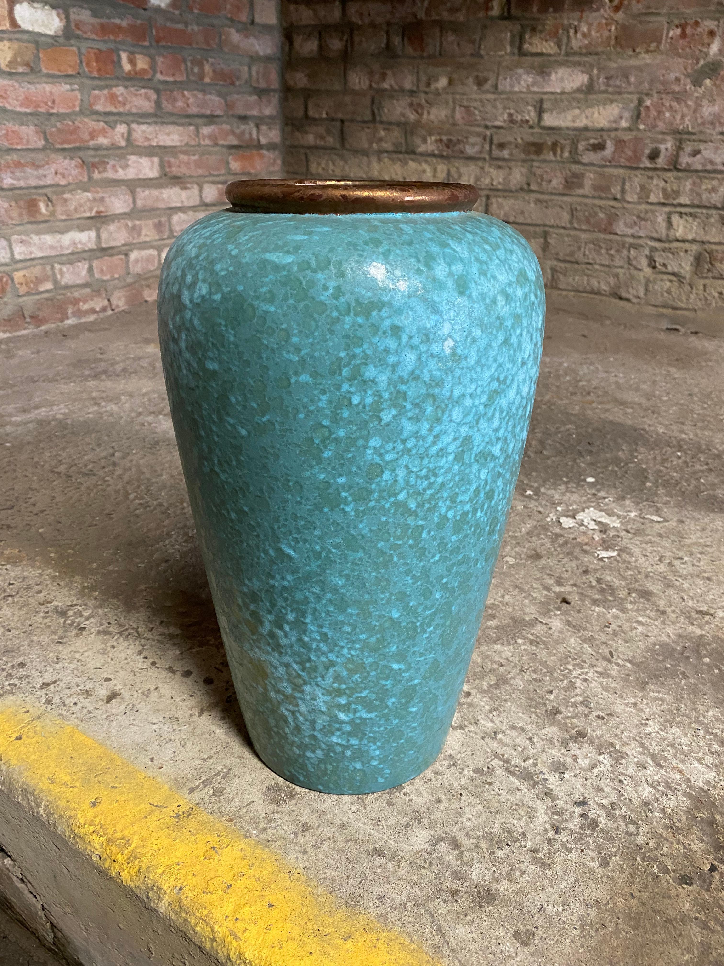 Large signed Scheurich West German art pottery vase. Speckled turquoise and robin's egg blue glazes with a metallic copper lip opening. Signed on the bottom with the Scheurich mark, W. Germany, and form number 504-38. Circa 1980. Nice tall form in
