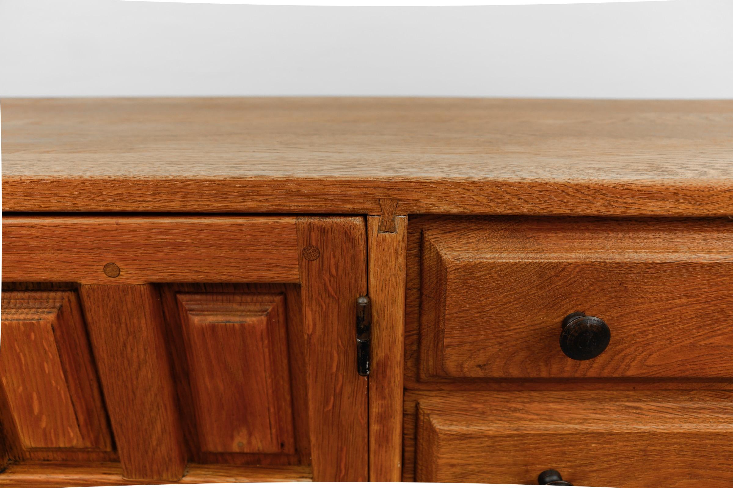 Large screwless sideboard made of carved oak, Spain, 1960s For Sale 6