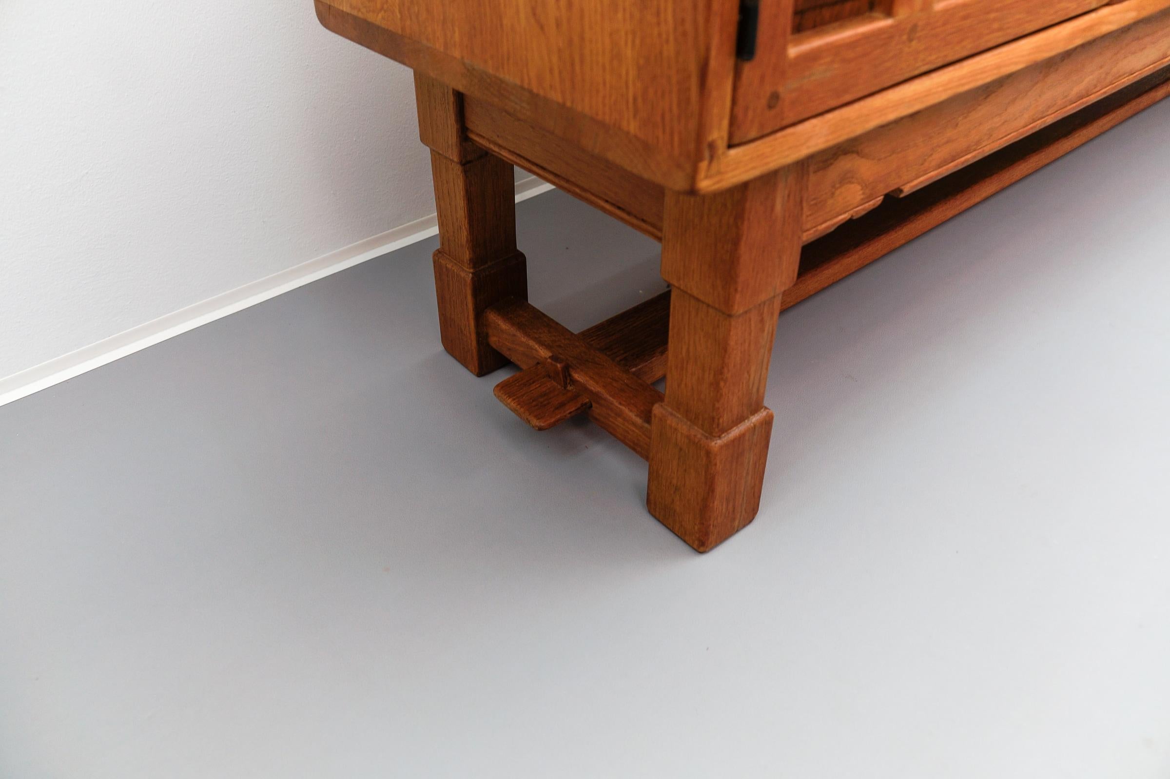 Large screwless sideboard made of carved oak, Spain, 1960s For Sale 7