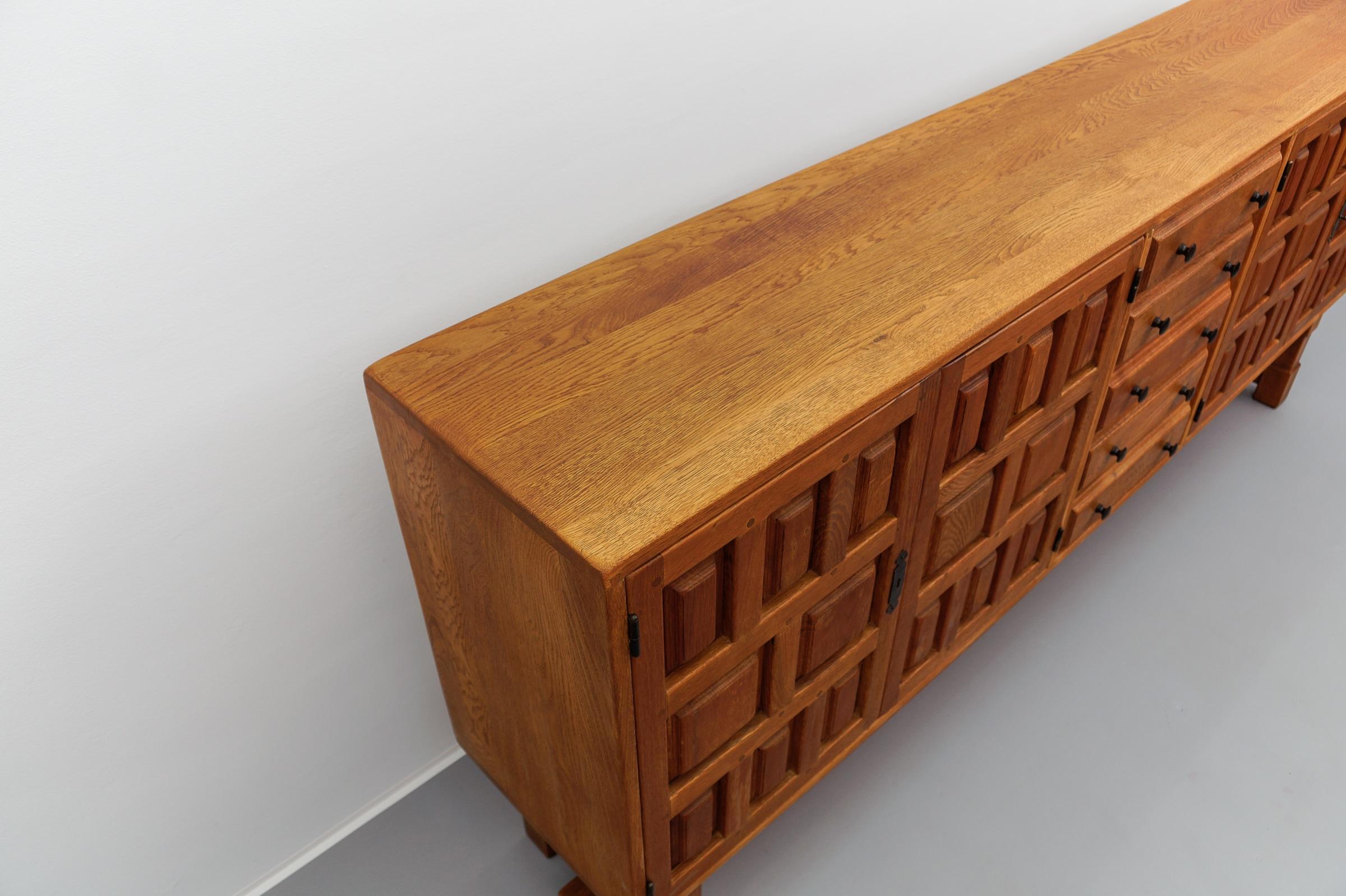 Large screwless sideboard made of carved oak, Spain, 1960s For Sale 12