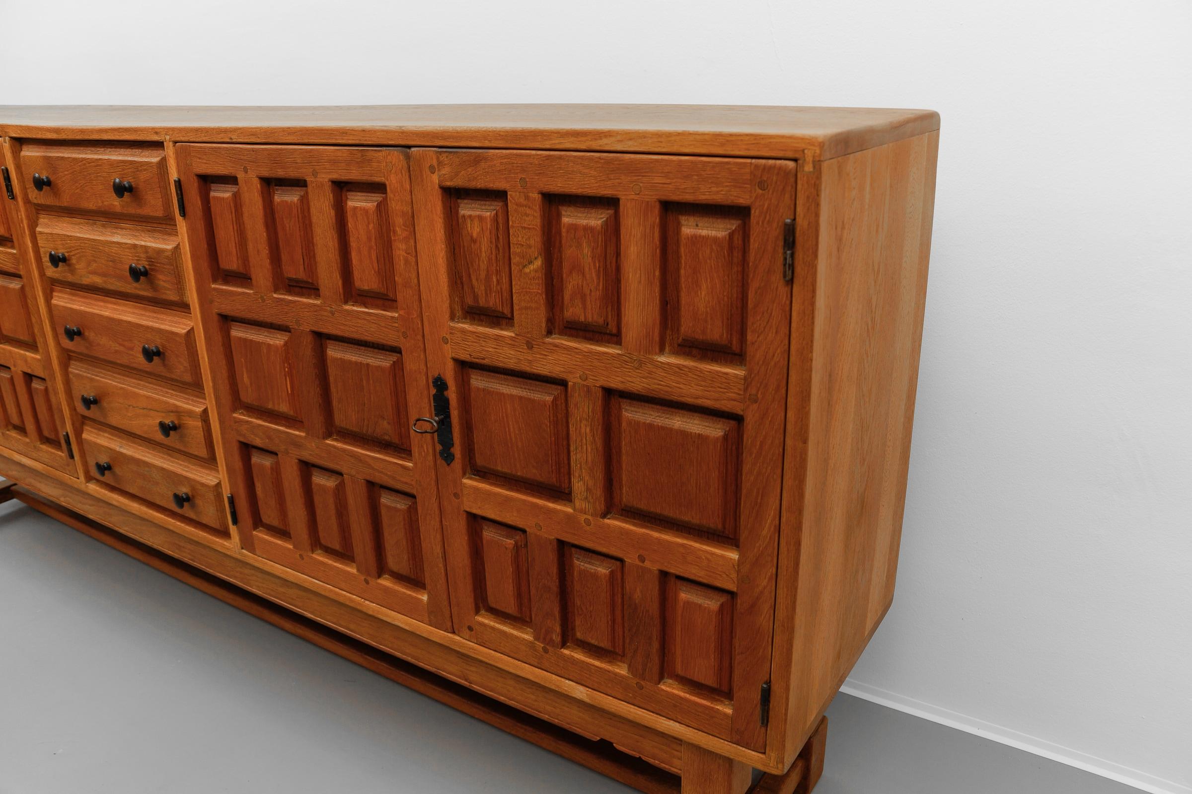 Mid-20th Century Large screwless sideboard made of carved oak, Spain, 1960s For Sale
