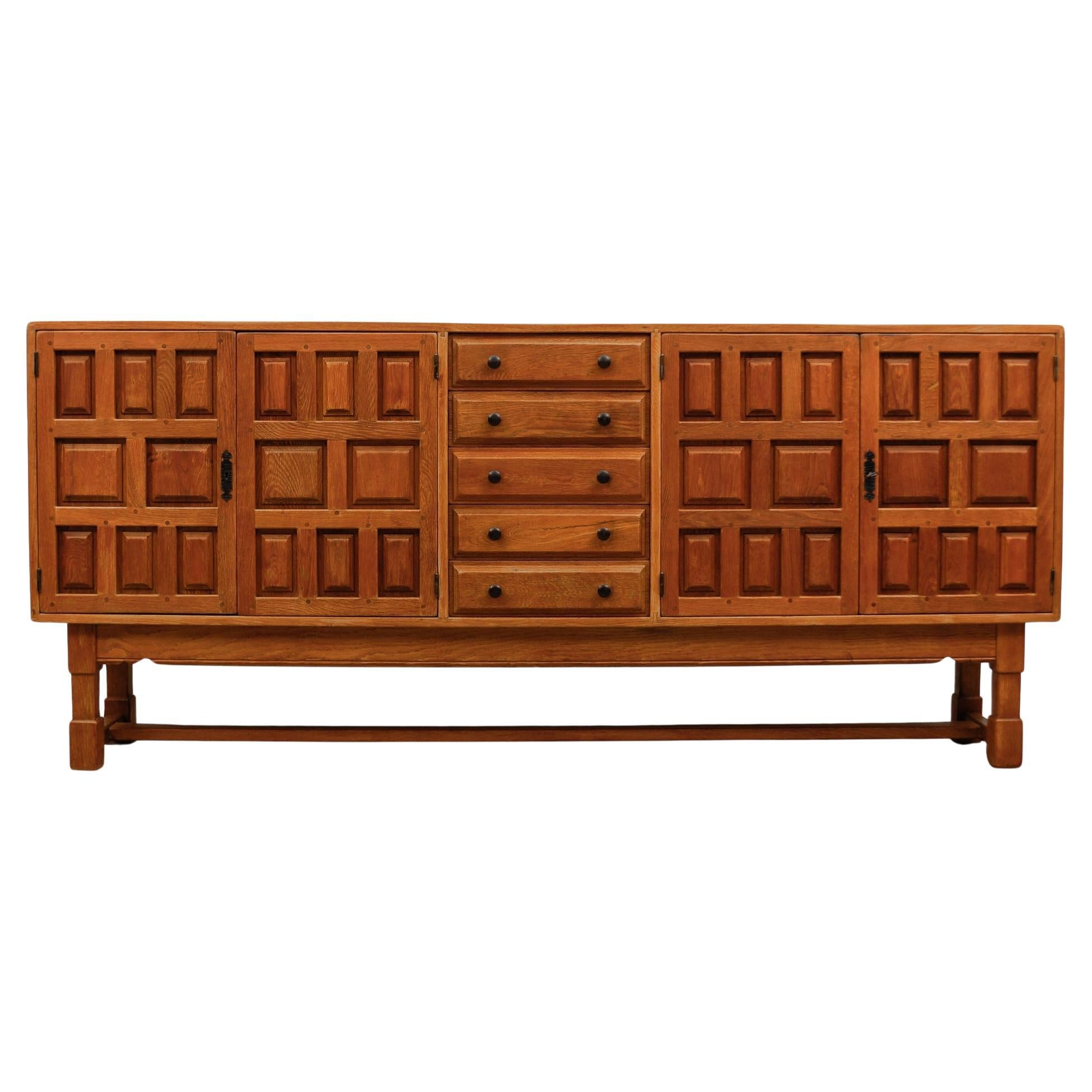Large screwless sideboard made of carved oak, Spain, 1960s For Sale