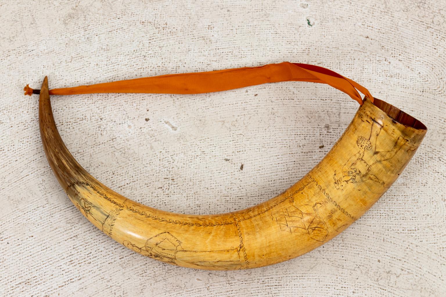 Gun powder horn composed of cow horn scrimshawed with motifs such as Scottish highlanders, ships, female figures, and floral trim, circa 1800s-1830s. Made in Scotland. Please note of wear consistent with age including minor finish loss.