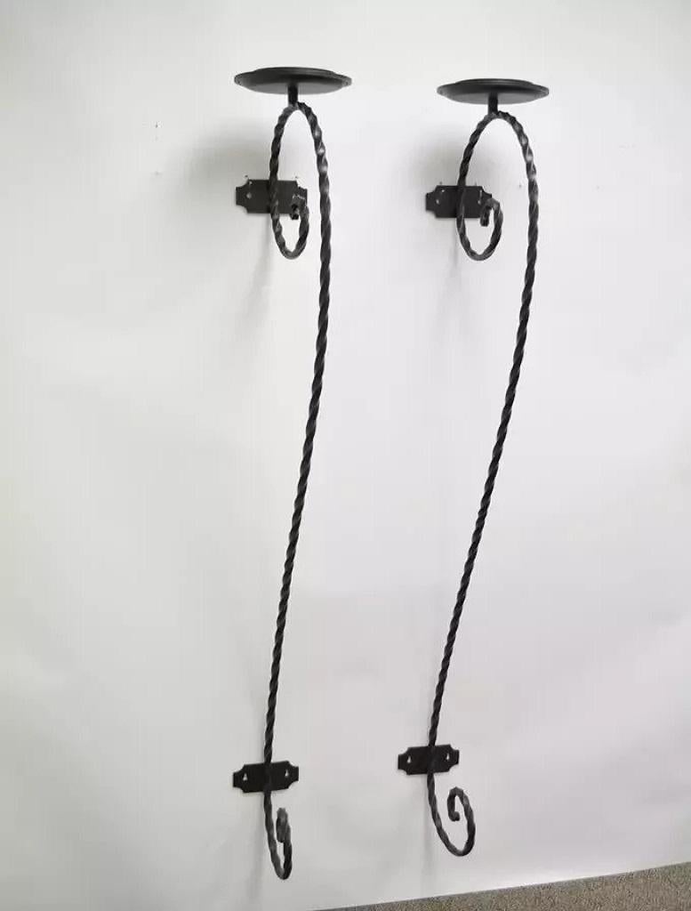 Large Scrolling Twisted Wrought Iron Candle Holder Wall Mounted Sconces - a Pair. Circa 21st Century, Pre-owned. Measurements: 71