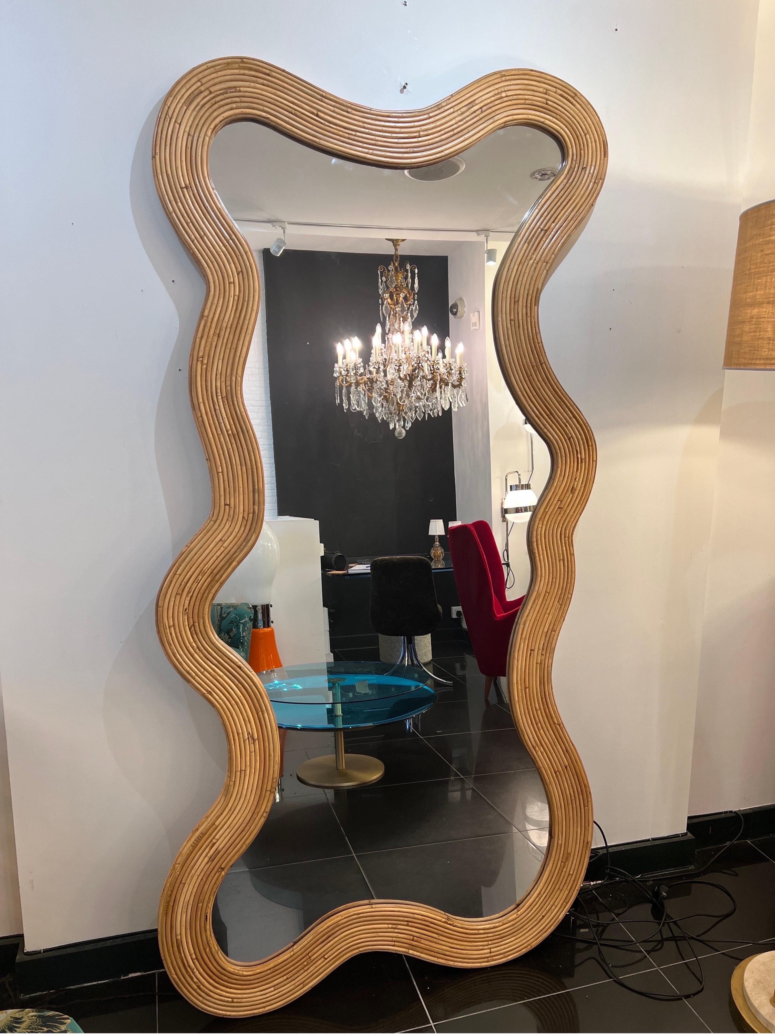 An extra large sculptural wall mirror made completely by hand in Italy with exceptional details and finishes . 
A fantastic functional art piece measuring H215cm (84.65in) X W103cm (40.5in) 
Italy 
Contemporary. (Limited edition) 
