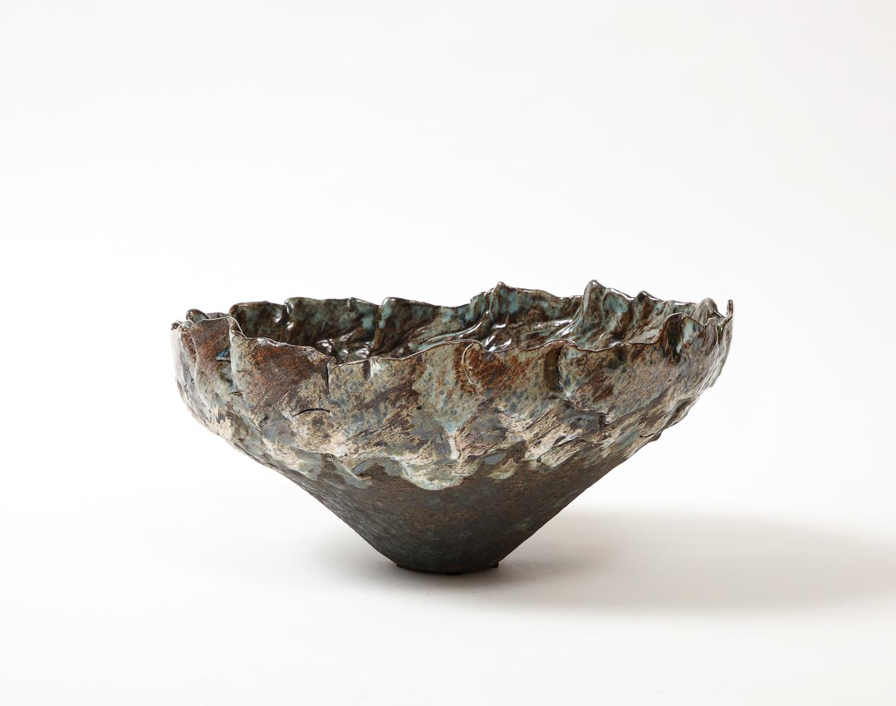 Glazed ceramic. Hand-built ceramic bowl with blue glazes. Artist signed on underside.