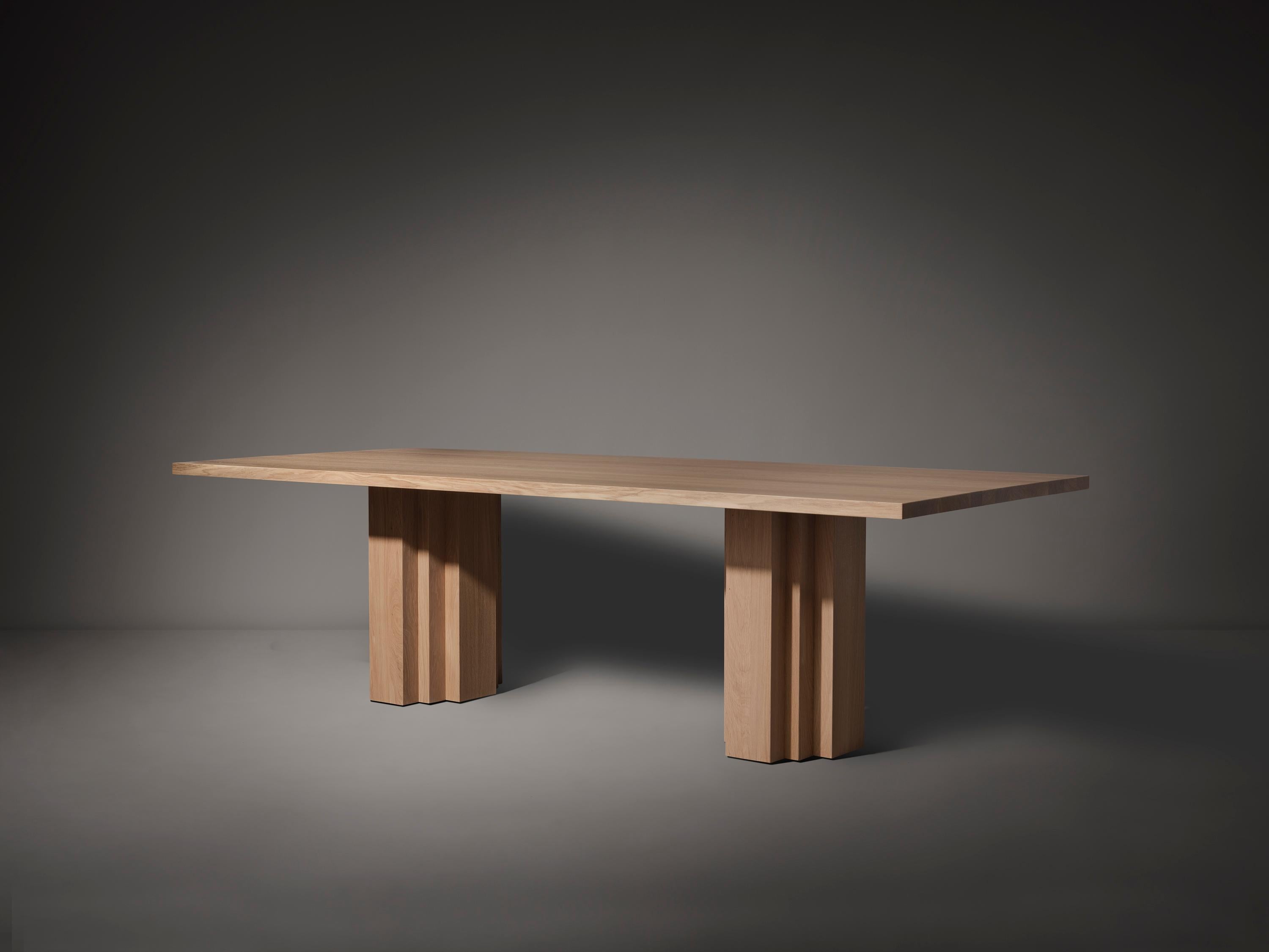 The Brut Table takes cues from Brutalism and Amsterdam School architecture. Voluminous columns with a monumental aesthetic support the heavy table top. The table is designed by Aad Bos and crafted in the Netherlands.

Mokko is an Amsterdam based