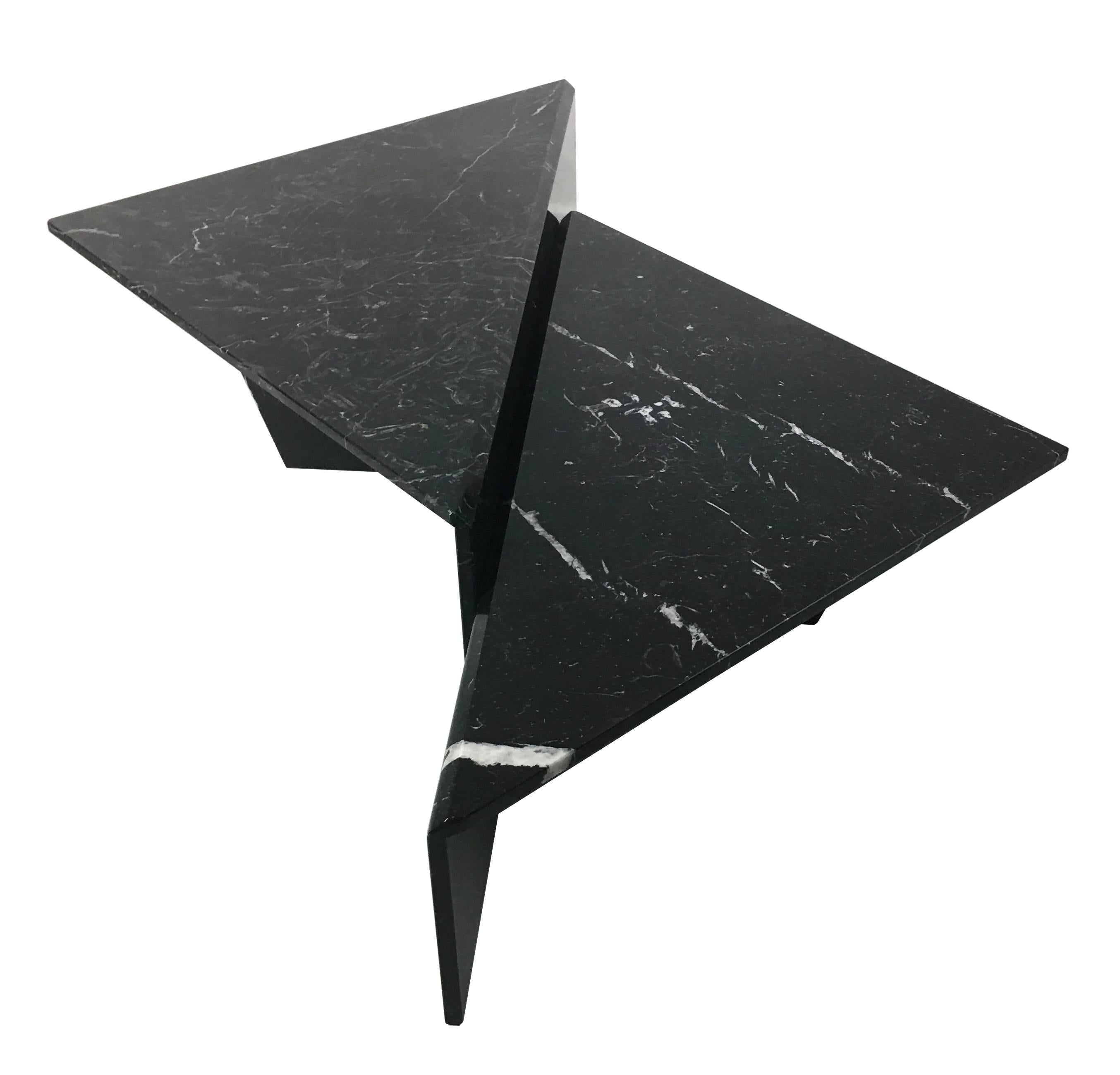 Fantastic sculptural two-piece, bi-level cocktail table in beautifully figured Nero Marquina marble. The table can be configured in a number of ways to compliment your seating with a super-chic 1970s vibe. All of the corners and joints are mitered