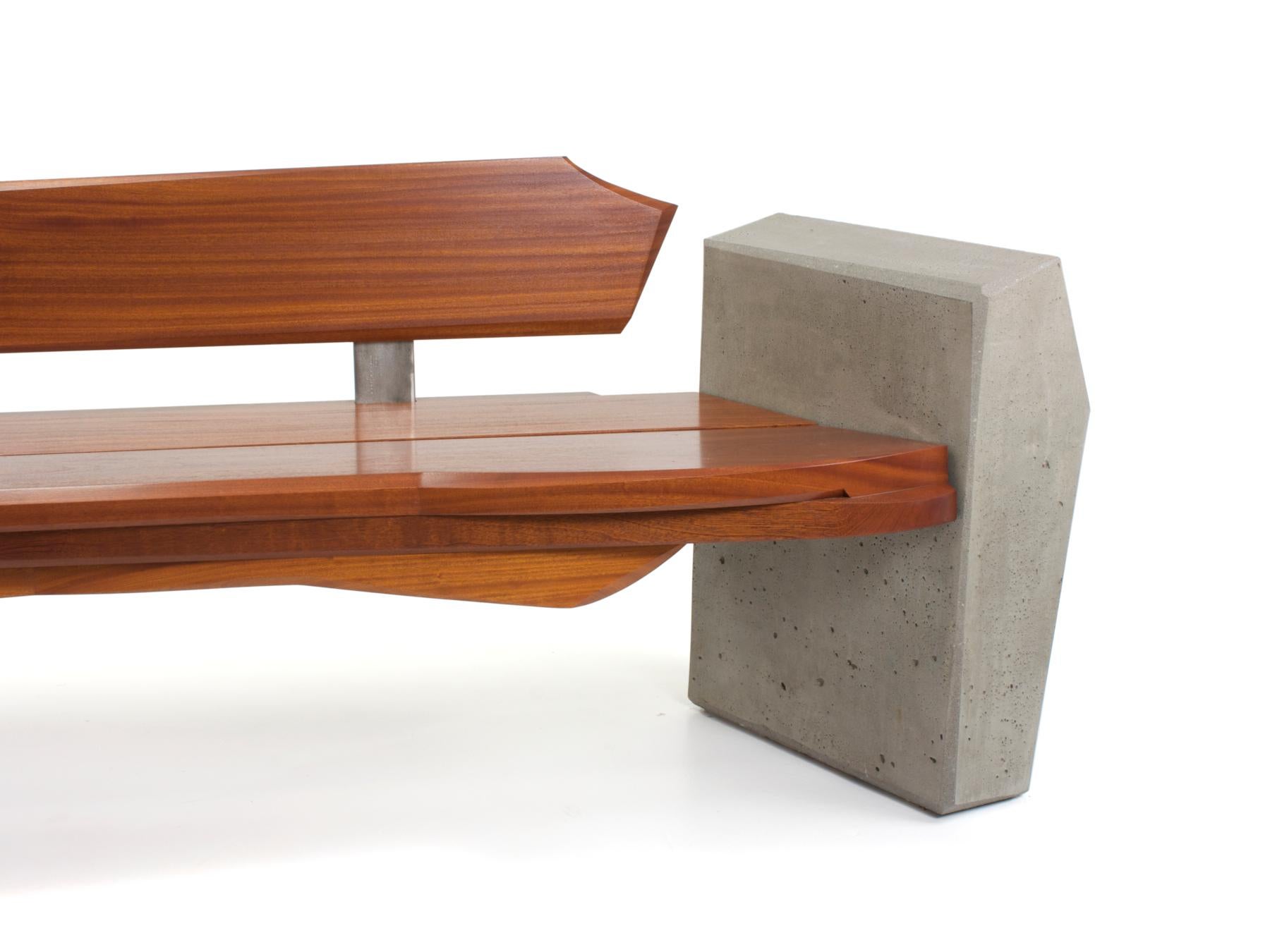 Bench #4 from Series #2 is a modern bench made of Sapele wood, cast concrete and Stainless Steel. This was the first piece that i designed with this type of bracket to suspend the back. The floating back introduced new concerns and needed to be