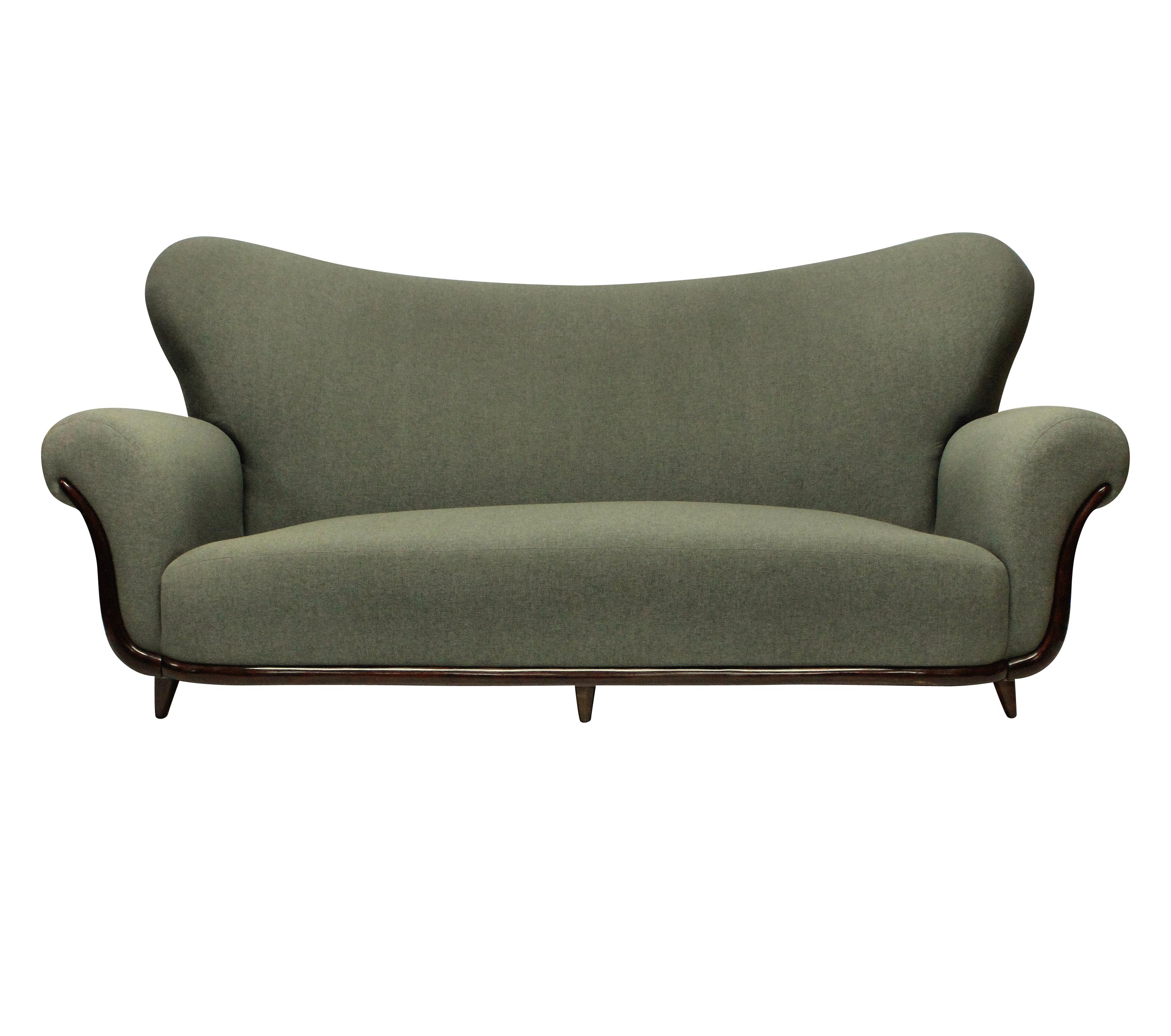 A large Italian sculptural sofa by Ulrich which is very comfortable. Newly upholstered in grey fabric and in a Minimalist fashion without piping or buttons, which accentuates the curved shapes. On tapering French polished feet and curved trim