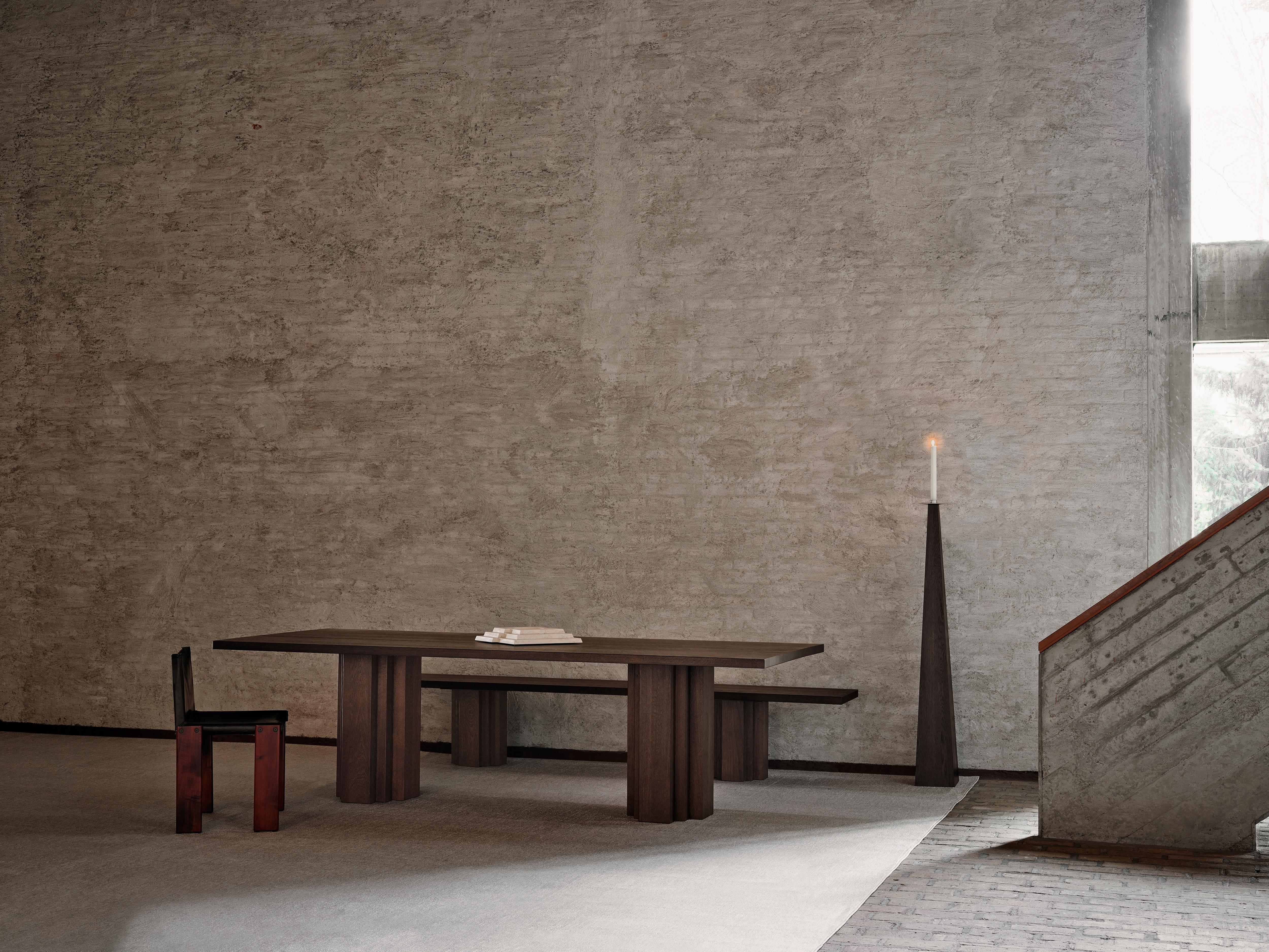 The Brut collection takes cues from Brutalism and Amsterdam School architecture. A balance of raw materiality and subdued forms with geometrically expressive detailing. The Brut bench functions as seating matching the Brut table or as an individual