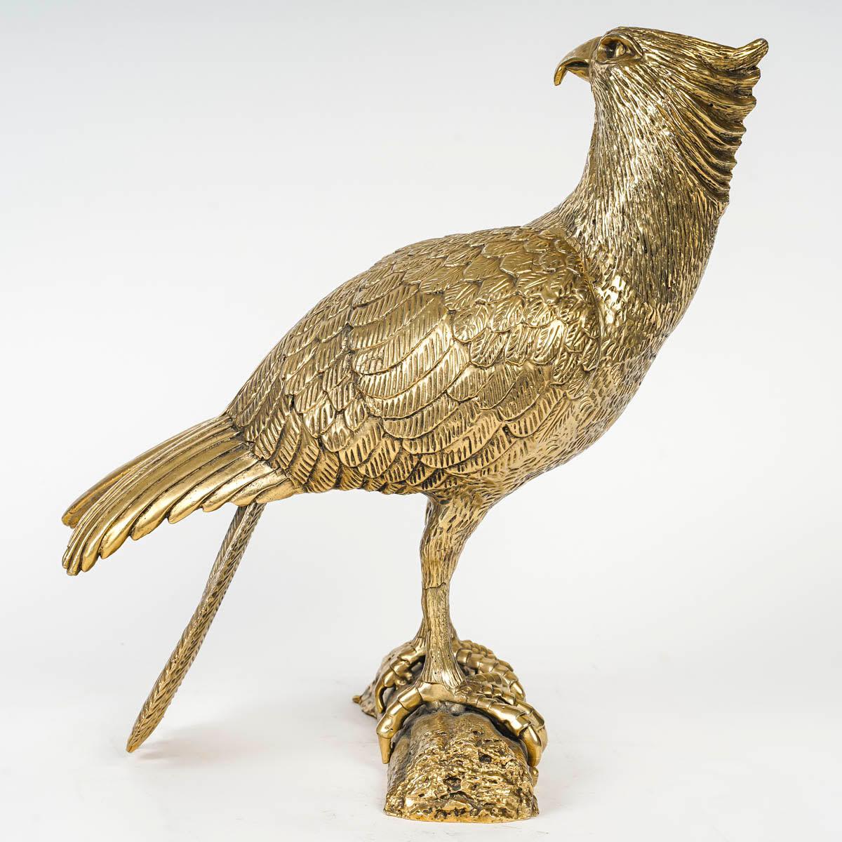 Large sculpture of an eagle in silver plated metal, 20th century.

Sculpture of an eagle in silver plated metal, could be a sculpture for a desk or a nice centerpiece, Empire style, XXth century.
h: 34 cm, w: 36cm, d: 21cm