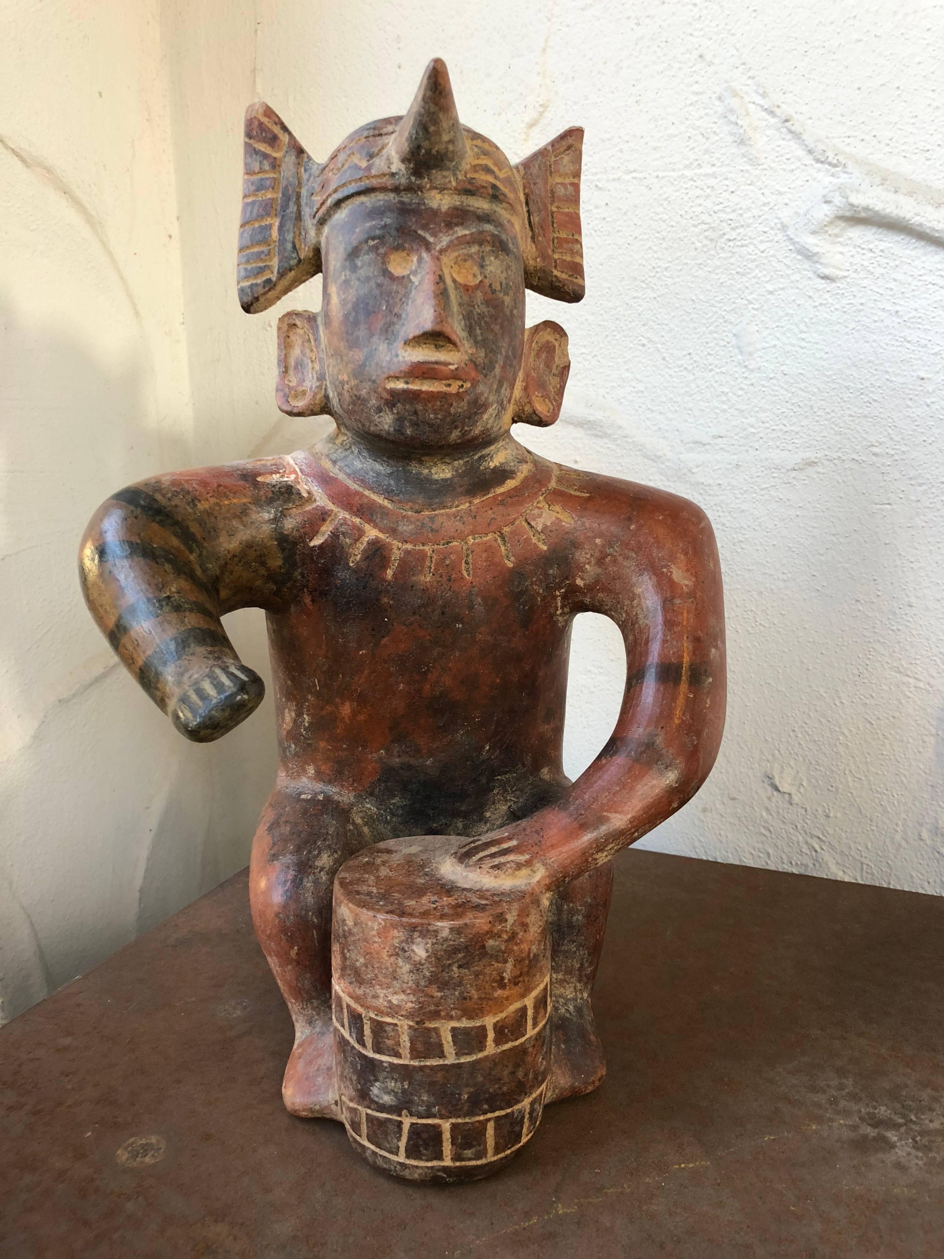 Provenance: Sothebys, NY
In excellent overall condition for its age.

Colima, located on Mexico's southwestern coast, was during this time part of the shaft tomb culture, along with neighbors to the north in Jalisco and Nayarit. In this culture,