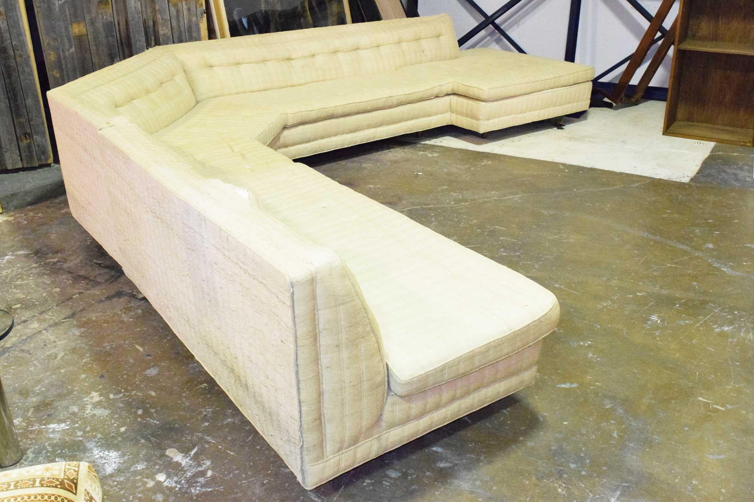 With an imagination, this sofa would be stunning once restored. It is a hard to find large sectional by Harvey Probber. Very sophisticated, will make a statement in any room. Inviting for large groups with plenty of seating. We can offer full