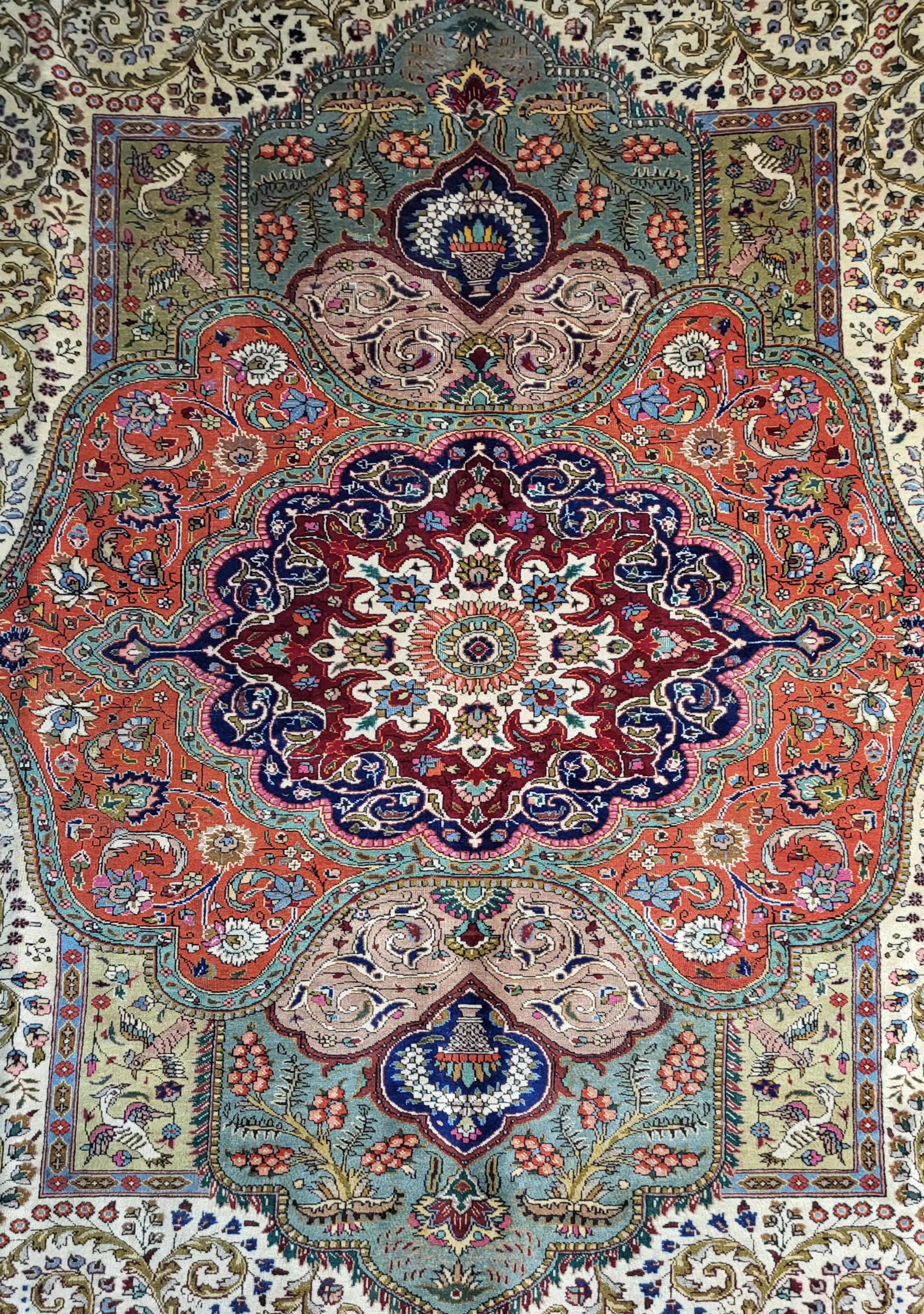 Exquisite 50's Persian Tabriz

10' x 13' 

Incredibly unique hand crafted master piece from the legendary city of Tabriz. Rugs from this area can range in design, but always feature a high level of quality in both design and materials. This piece is
