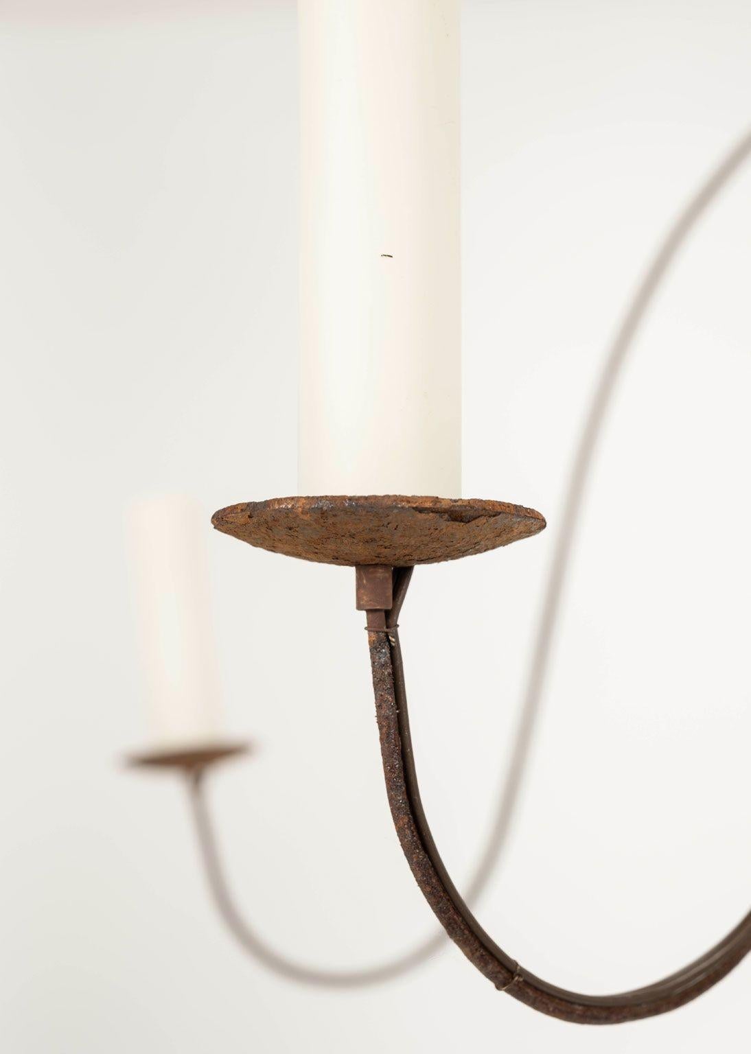 Large semi-bleached hand-carved wood and steel six-arm chandelier, newly created from 19th century and new elements. 19th century hand-carved body bleached to a grayish dusty light brown color. Six steel arms, each with a candelabra-size socket.