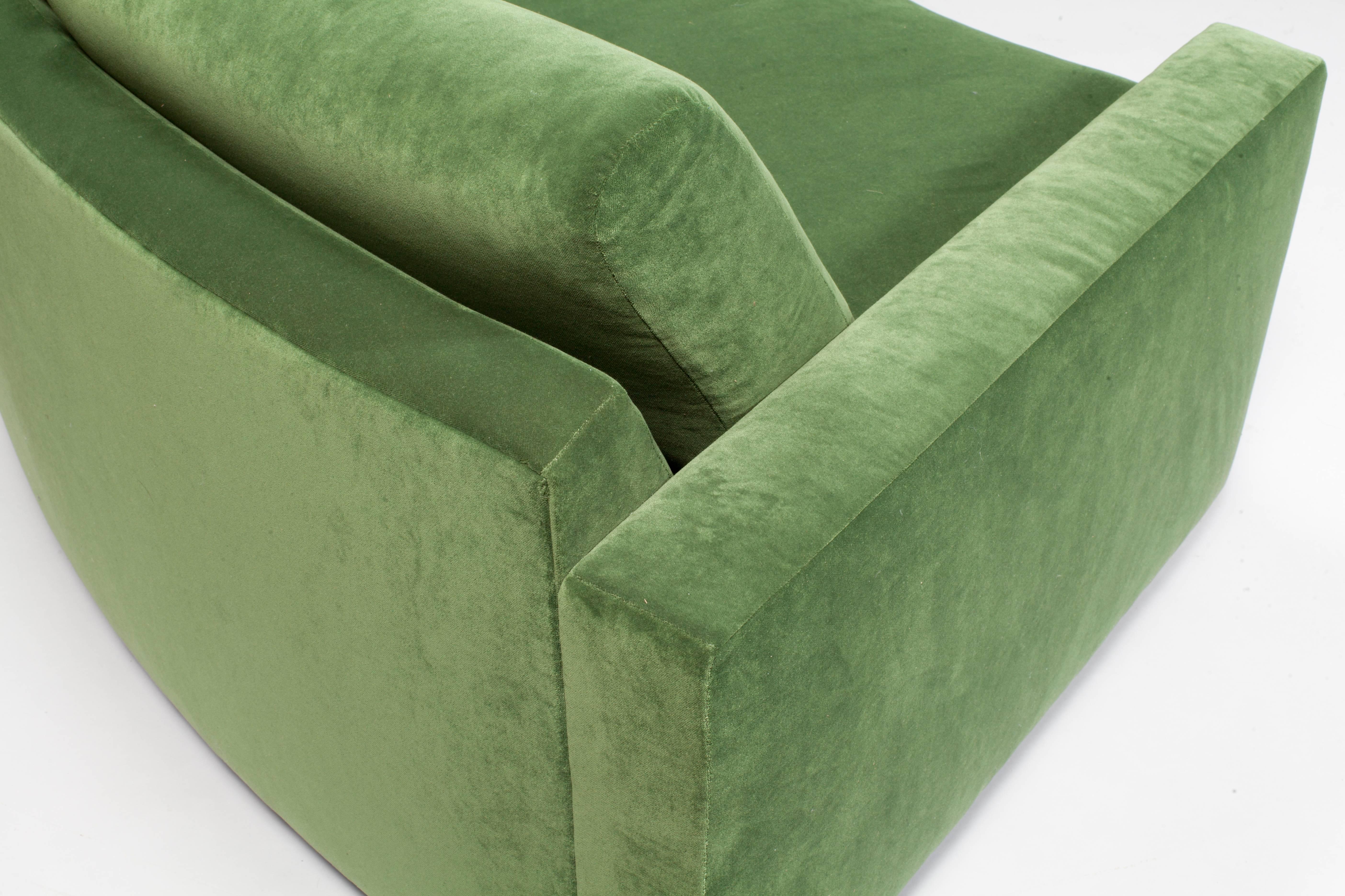 Large semicircle sectional newly upholstered in green velvet.