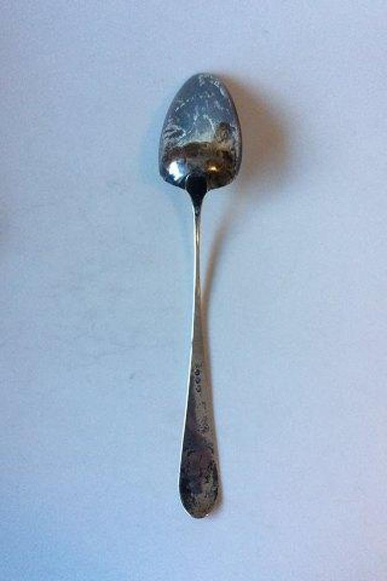Large serving spoon in silver. Marked AS. Engraved and with Dents. 

Measures 41 cm / 16 9/64
