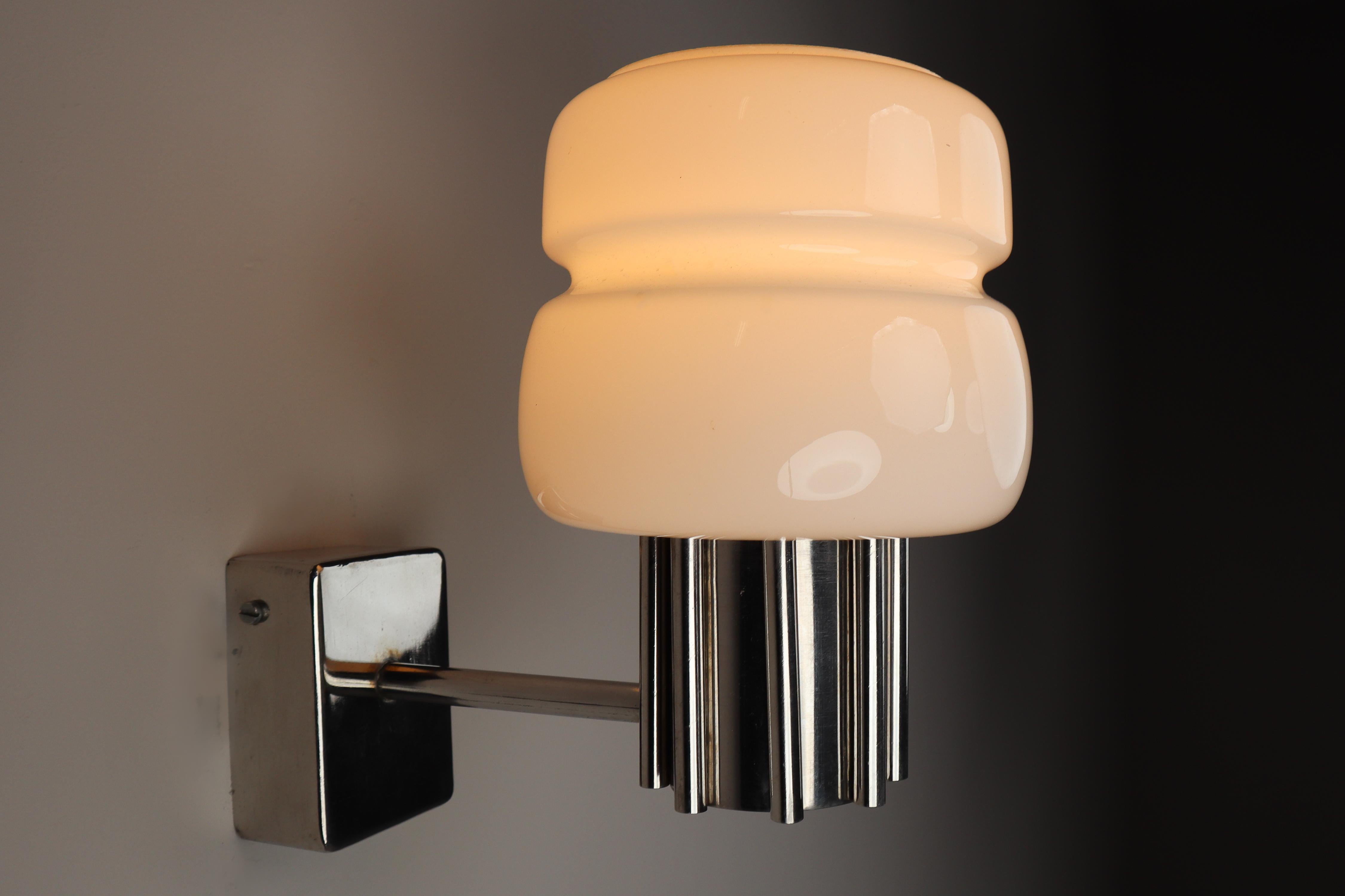 Mid-Century Modern Wall Lights Opaline Glass and Steel, Italy, 1970s

Modern Italian wall lights with steel and opaline glass, Italy, the 1970s. The pleasant light it spreads is very atmospheric; The stylish elegance of this lamp suits many