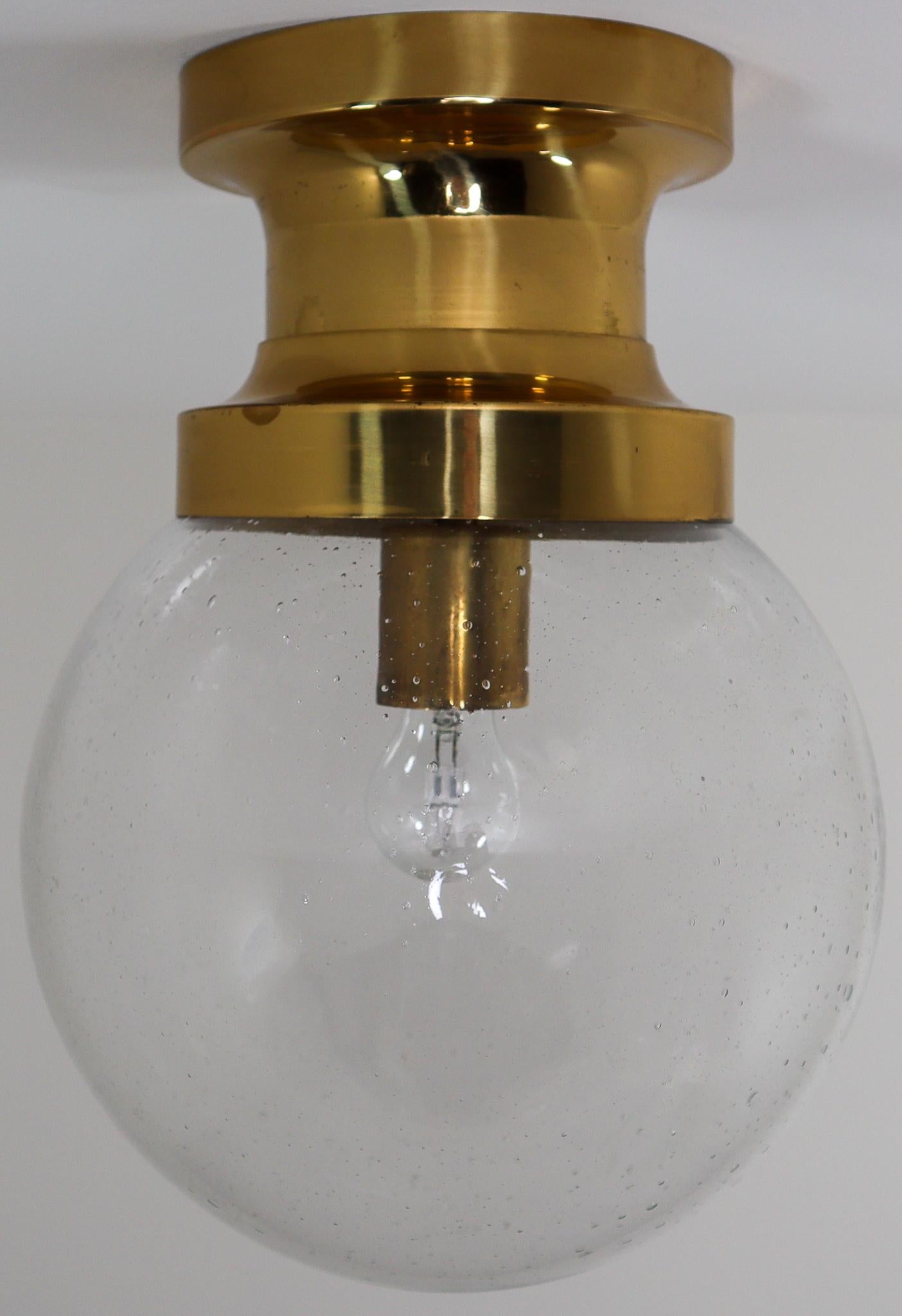 Large set hotel ceiling/wall lights with brass frame and large hand blown glass. The lights are beautifully thanks to the hand blown glass. These lights were originally founded at large hotel in Vienna, Austria. The pleasant light it spreads is very