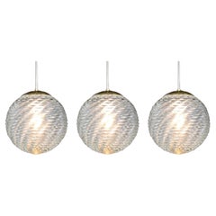 Large set Midcentury-Modern Brass and Pattern Glass Pendants, Prague 1960s