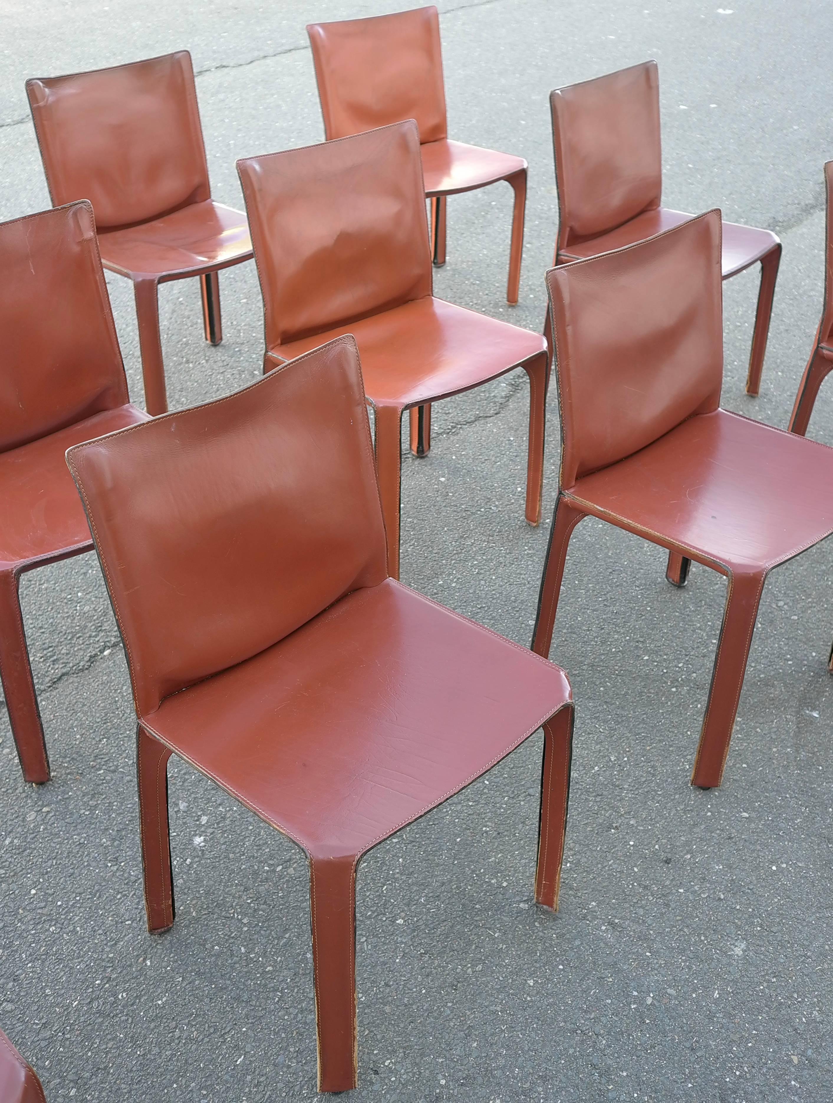 Large set of 15 leather 412 Cab chairs by Mario Bellini for Cassina.

Wonderful original patina and wear. Broken in like your favourite baseball glove. They have various patina, stains, rubs, scratches and wear. And we wouldn't have it any other