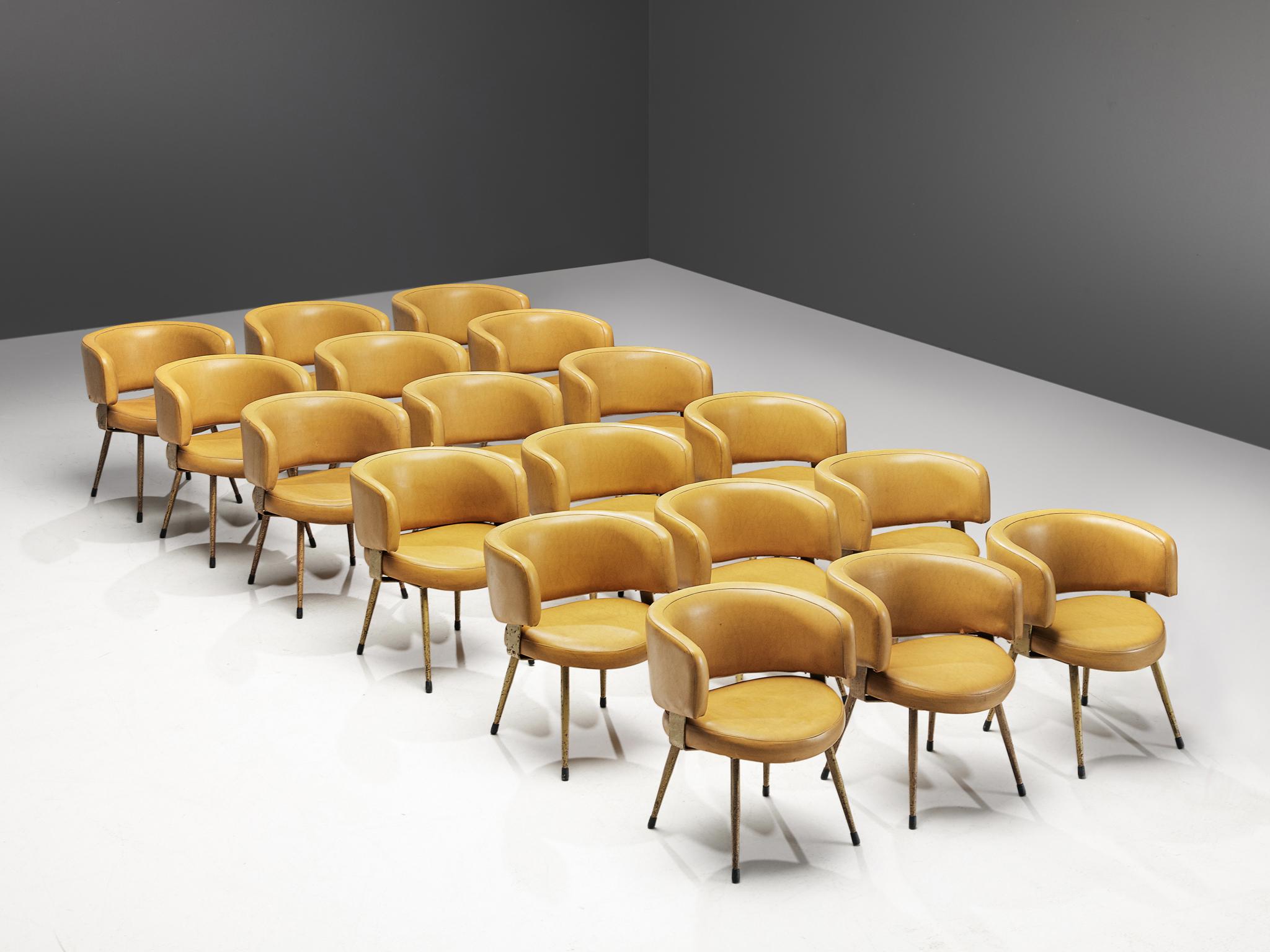Large set of armchairs, leatherette and metal, Italy, 1970s

A large set of 18 dining chairs with curved backrests that surround the seater, creating a comfortable and embracing feeling. The chairs feature a mustard yellow colored upholstery,