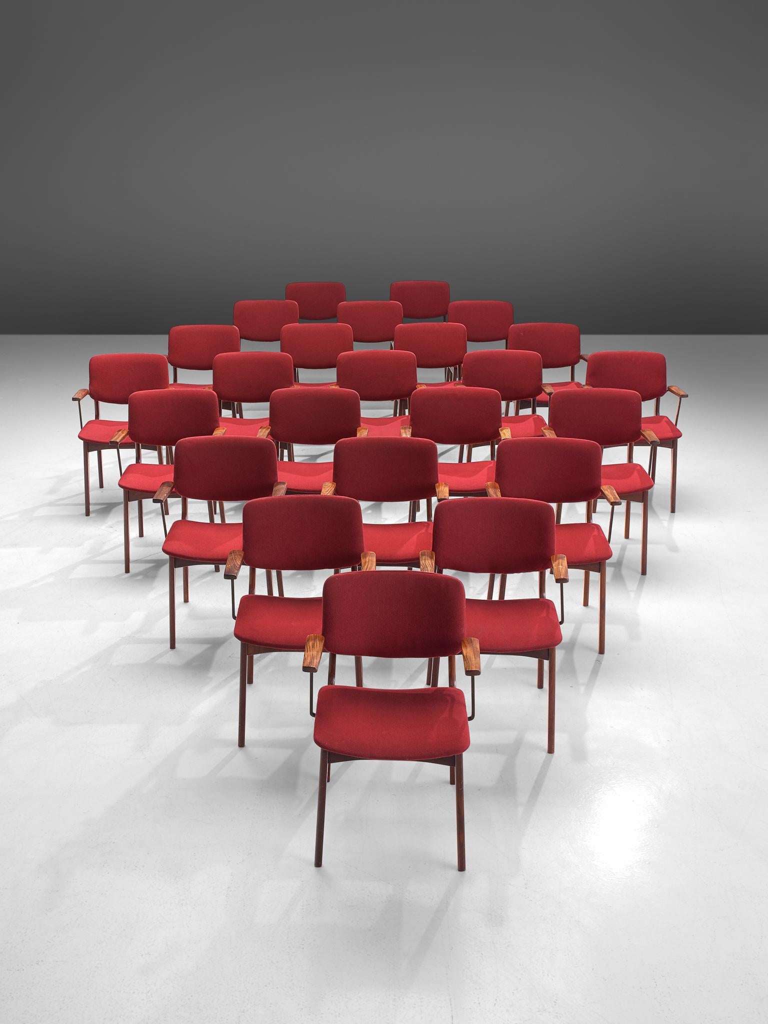 Large set of armchairs, fabric and teak, The Netherlands, 1960s.

Large set of arm dining chairs executed with a simplistic, teak frame. The chairs feature industrial armrests, kept in their place by a metal construction and finished with wooden