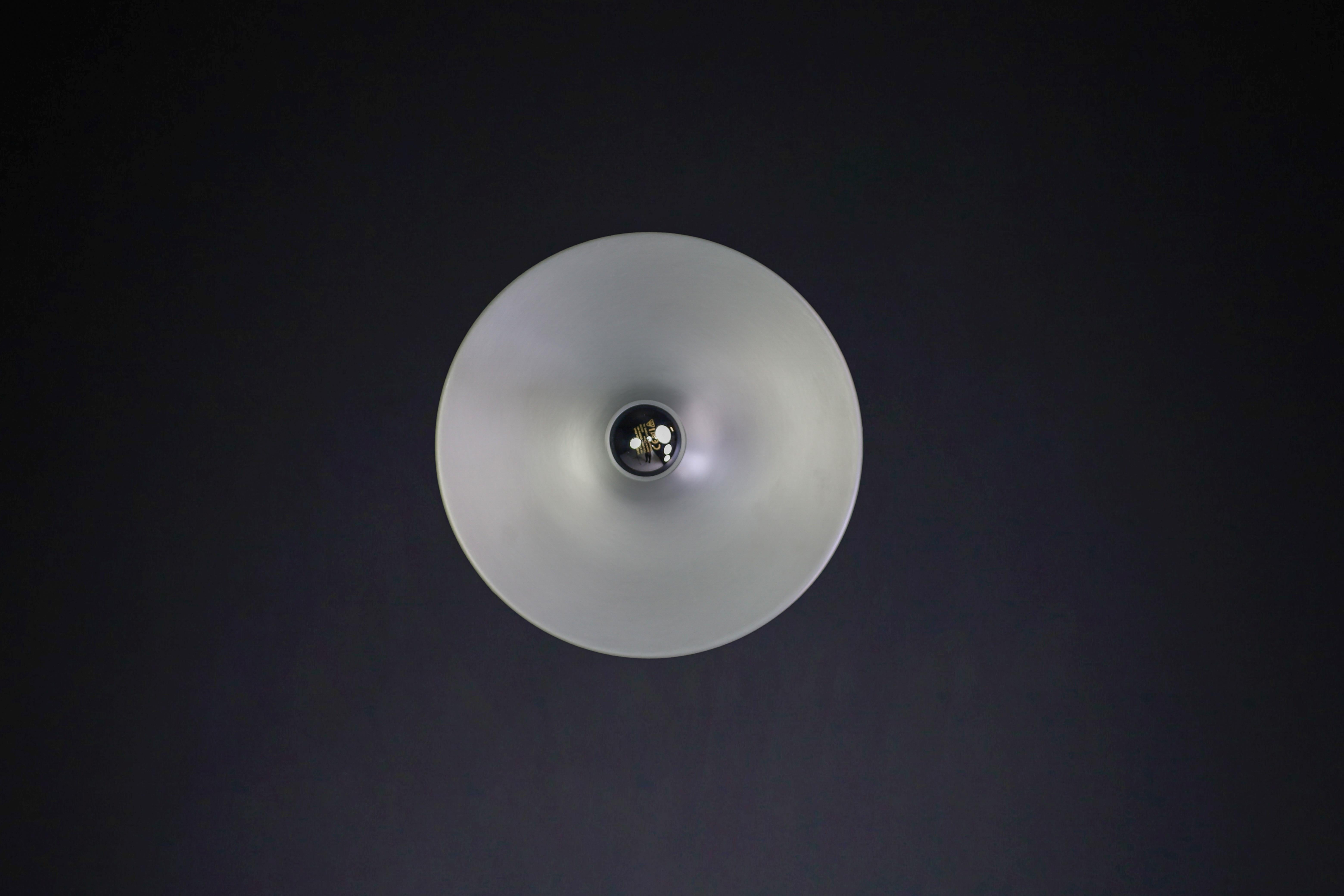 Large set of Charlotte Perriand Aluminum Disc Wall Lights, Germany 1960s   For Sale 9