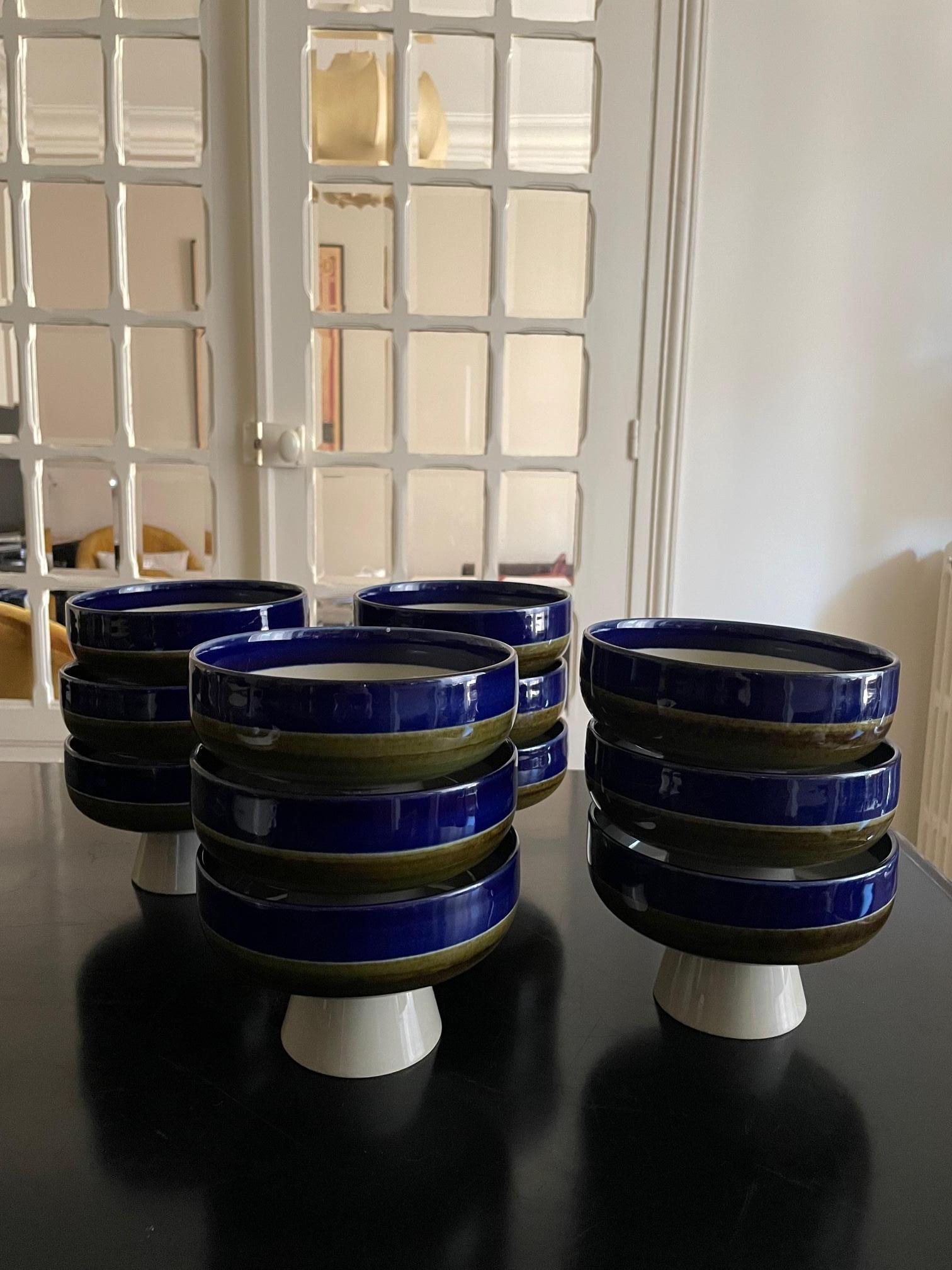 set of 12 bowls and one pot, design Marianne Westman for Rörstrand in 1969.