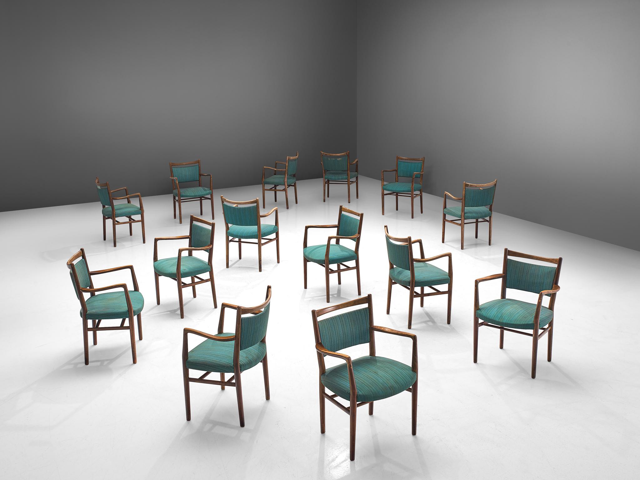 Set of 14 dining chairs, beech and fabric, Denmark, 1960s

Well made set of 14 armchairs from Denmark. The chairs feature a modest design with a high back. The back is partly open and partly upholstered which gives the appearance to be clamped by