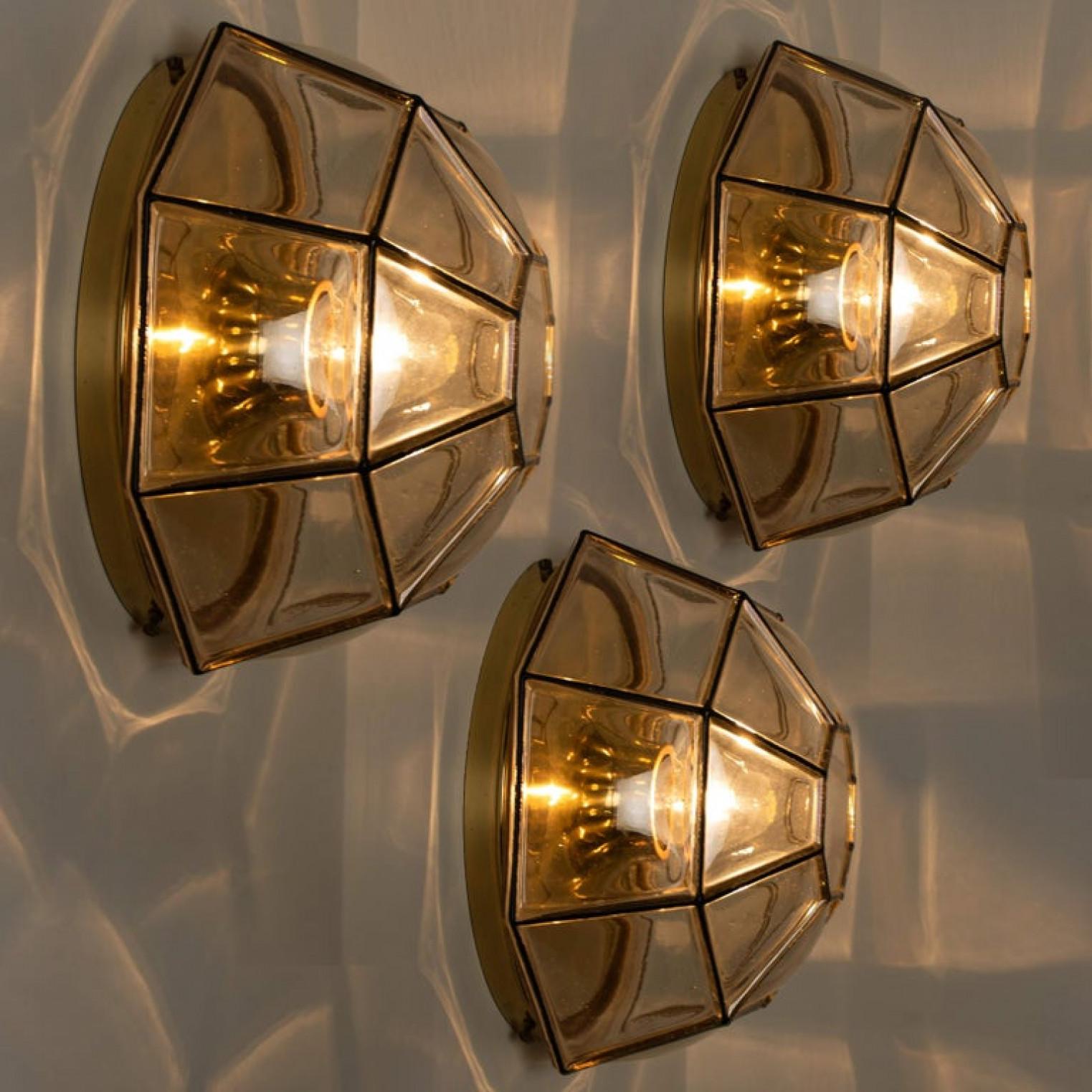 Mid-Century Modern Large Set of Iron and Clear Glass Flush Mounts/Wall Lights by Limburg, 1960s For Sale