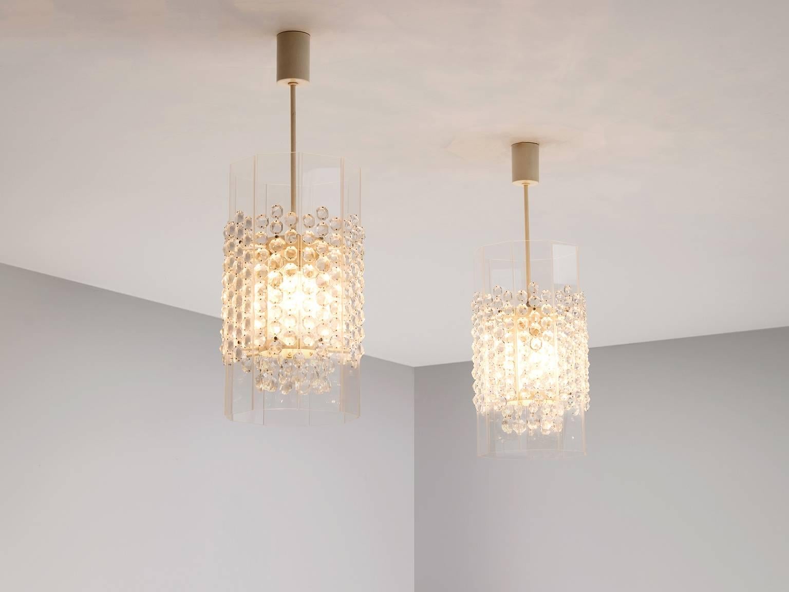Large set of chandeliers, in perspex, glass and metal, Germany, 1975. 

Large set of shimmering pendants. These lights have a real simplified design and occur. Due the glass diamonds on the Lucite shade they get an exceptional appearance. The