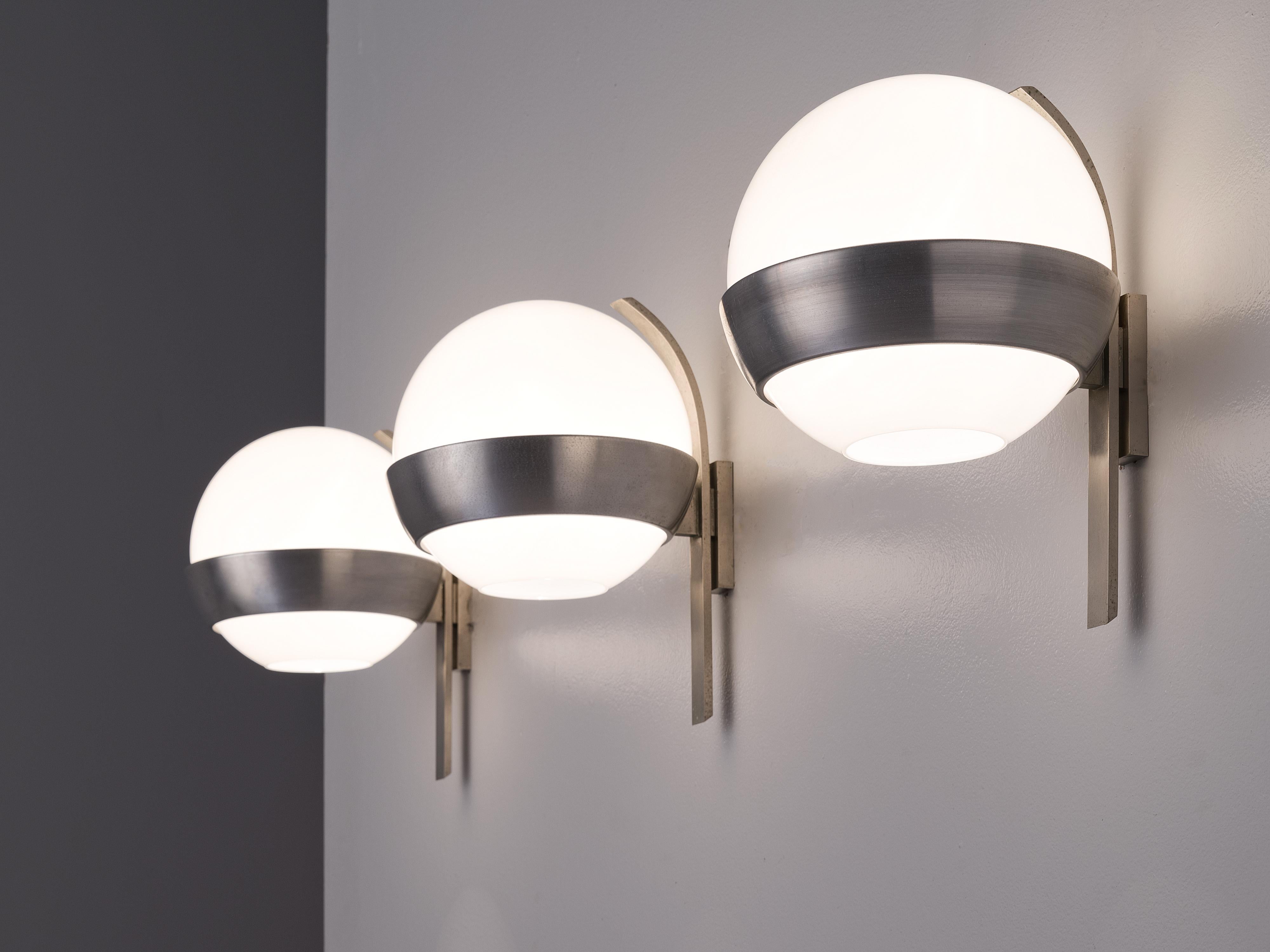 Lumi Milano, model 884 wall lights, anodized aluminum, steel, opaline glass, Italy, 1970s.

These stunning wall lights are made by the high-end production company Lumi in Milan. The lights are wonderfully clean in their design and the metal forms a