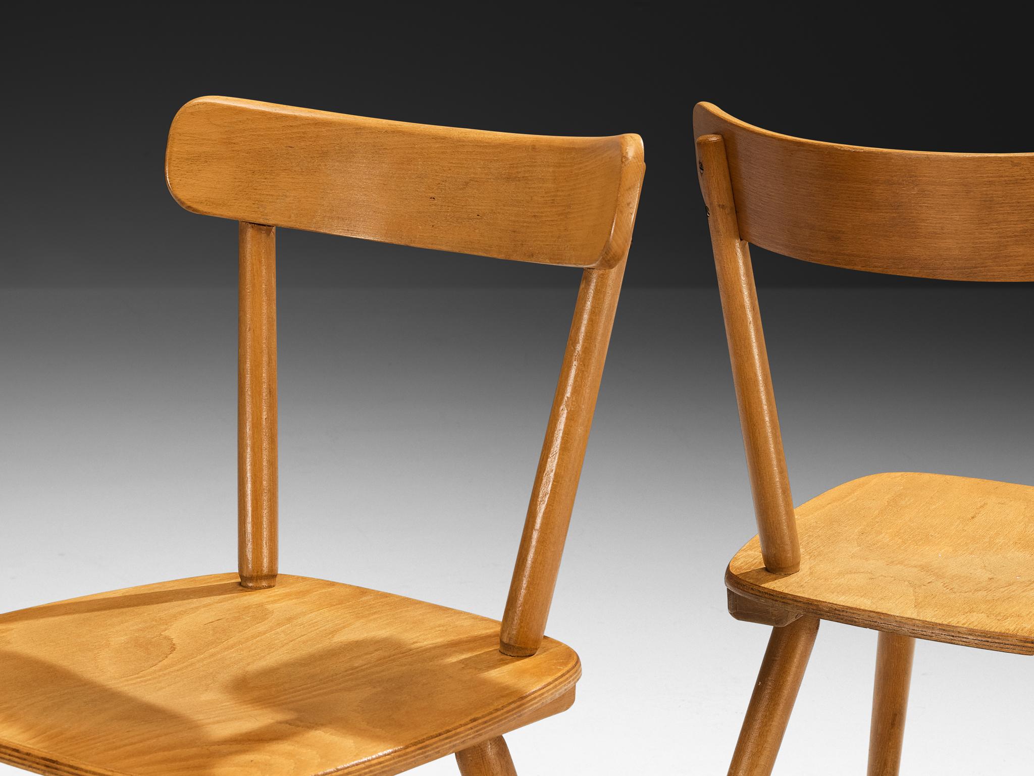 Dining chairs, beech, Europe, 1960s 

This kind of chair design was not meant to impress through extravagance, but through clarity. It is a humble piece, but in its shape, you see the confidence of a post-war design ethos: efficiency with warmth,