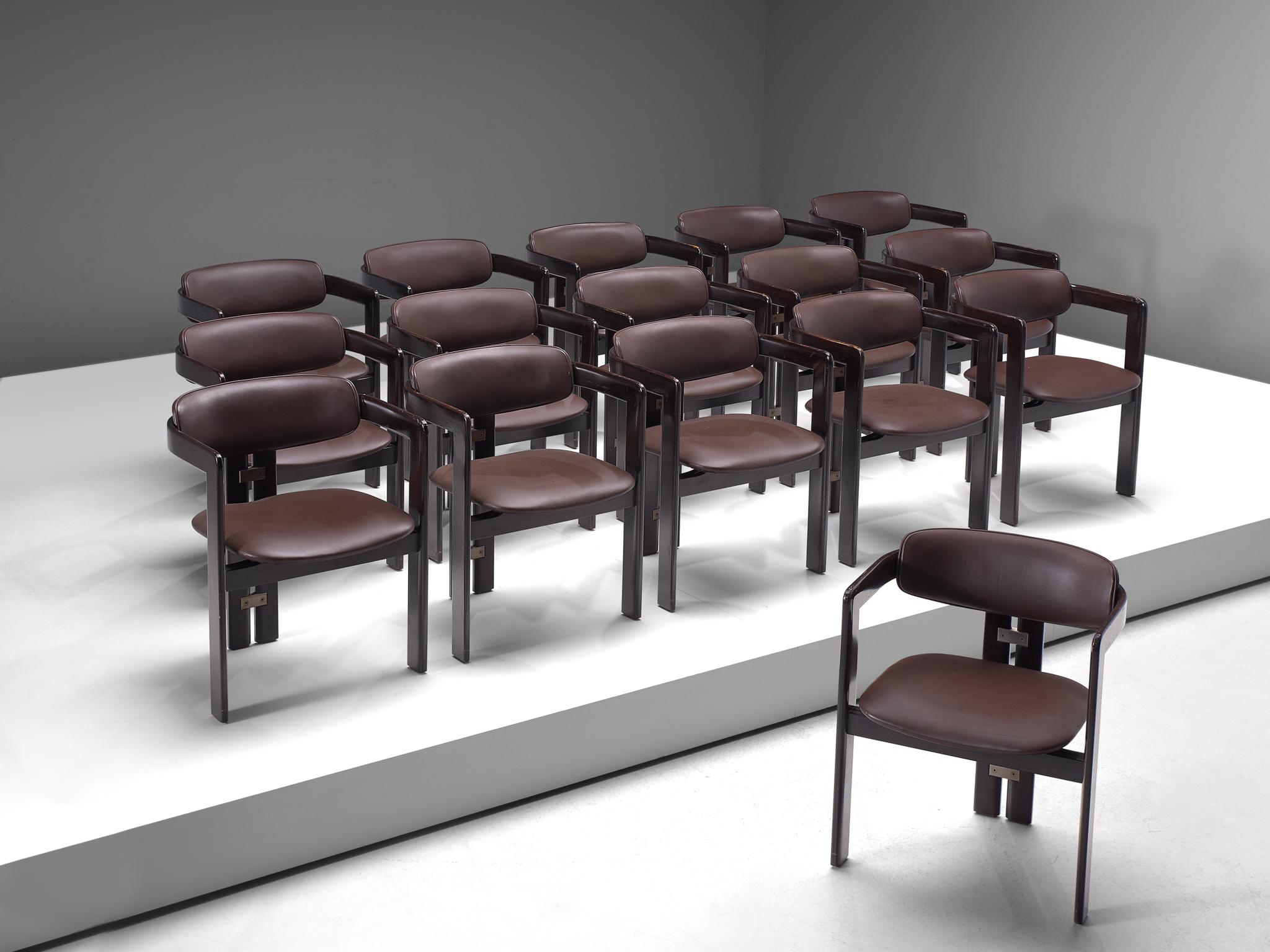 Augusto Savini for Pozzi, set of 16 ‘Pamplona’ armchairs to be reupholstered, chocolate brown leather, darkened wood, metal, Italy, 1960s.

Set of sixteen armchairs that will be customized as you desire. This example features a frame of darkened