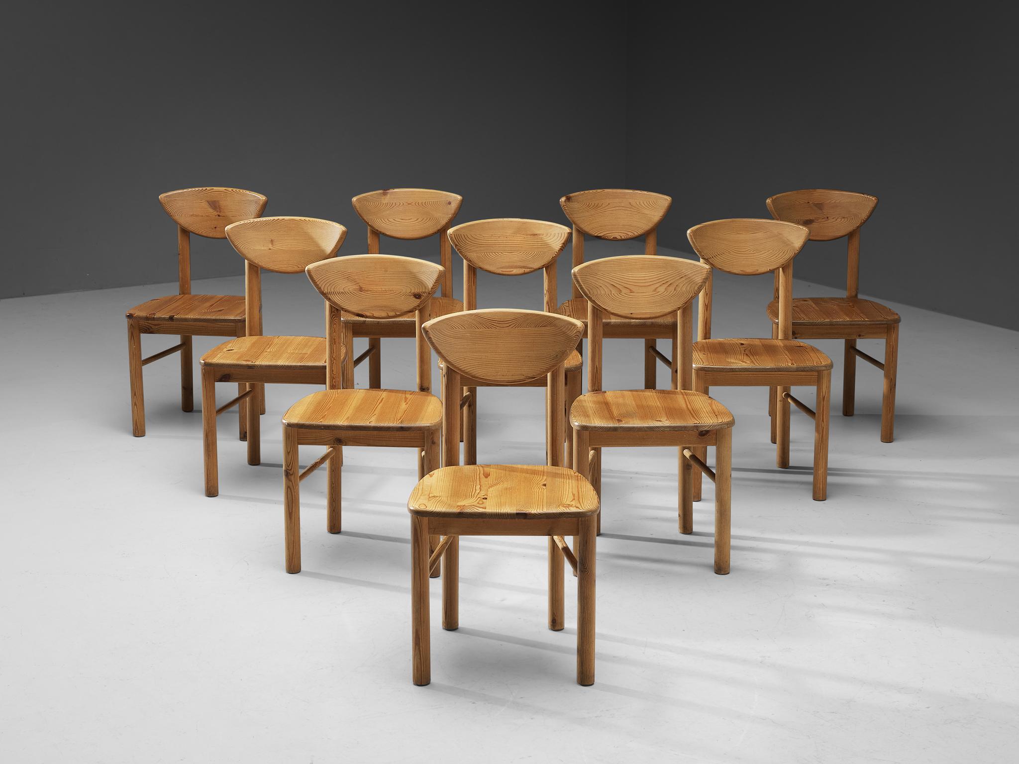 Set of ten dining chairs, pine, Denmark, 1970s. 

Set of ten beautiful, organic and natural dining chairs in solid pine. A simplistic design with a round seating and attention for the natural expression and grain of the wood. These chairs hold a