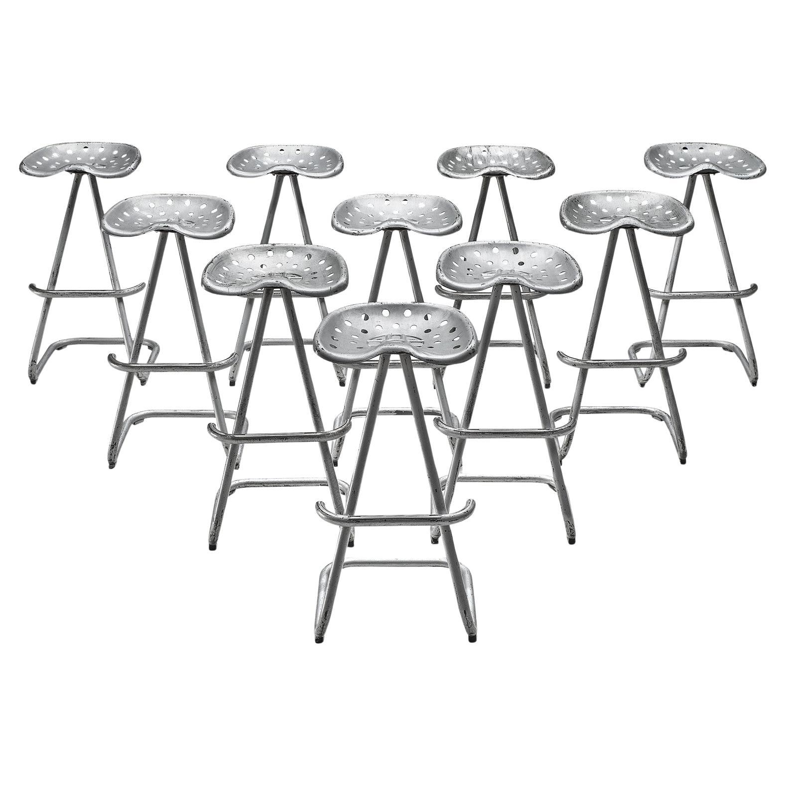 Large Set of 'Tractor' Stools in Silver Colored Metal For Sale