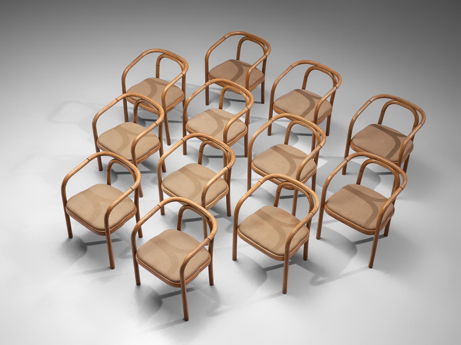 Ton, set of twelve armchairs, stained beech and fabric, Czech Republic, 1960s.

This elegant set chairs, manufactured by Ton, features a wonderful bentwood frame. Simplistic design and a more modest model of Ton and Thonet.
TON was founded after