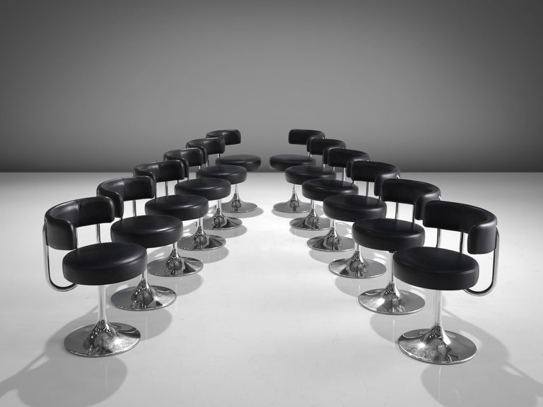 Börje Johanson for Johanson Design, set of twelve barstools , metal and black leatherette, Sweden, 1970s.

Highly comfortable Swedish barstools in black leatherette upholstery. Due to the soft seat and back, these chairs provide a very pleasant