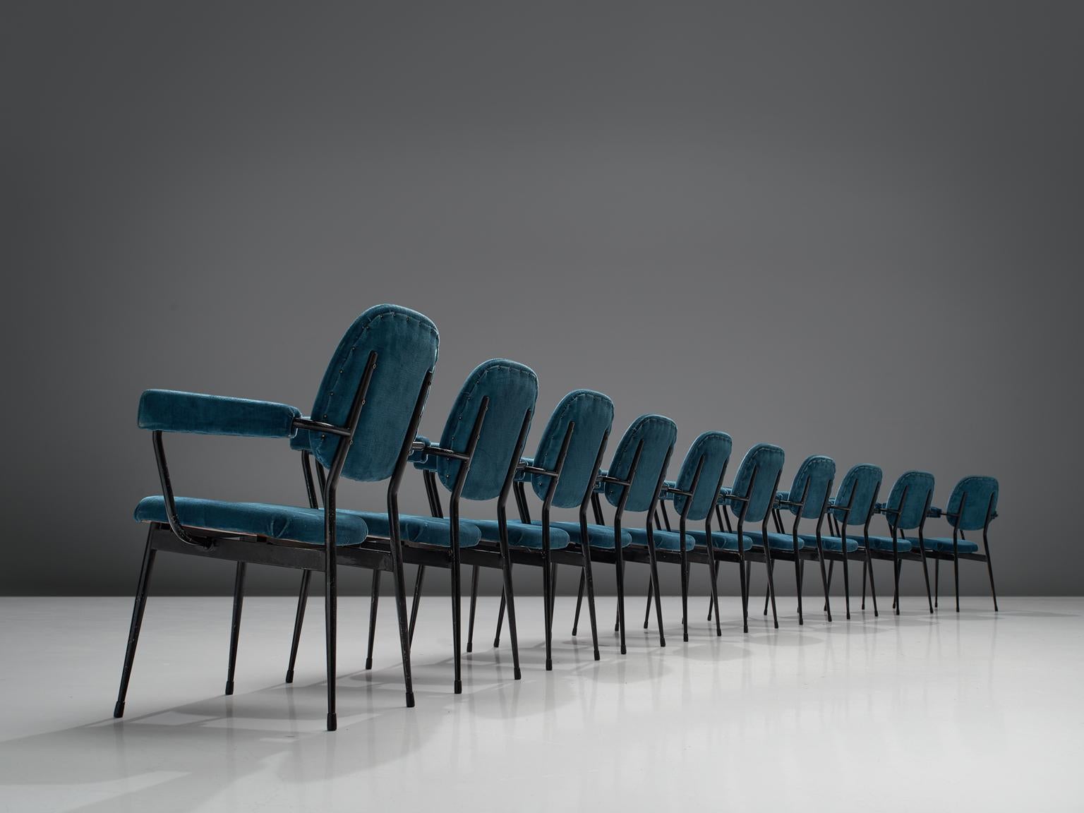 Set of 12 chairs, blue velvet, metal, Italy, 1950s

These 12 chairs with varnished metal rod structure are upholstered with blue velvet leatherette. The chairs are delicate and slender yet strong in their construction. The armrests are upholstered